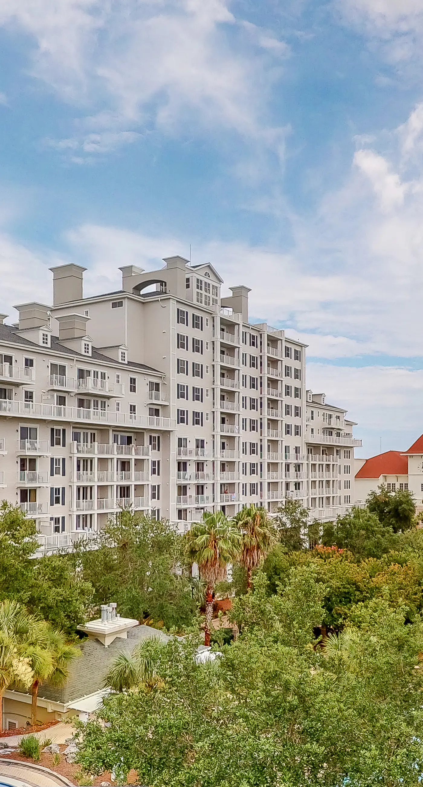 2nd-floor resort condo with balcony, on-site pool, golf, tennis & beach access