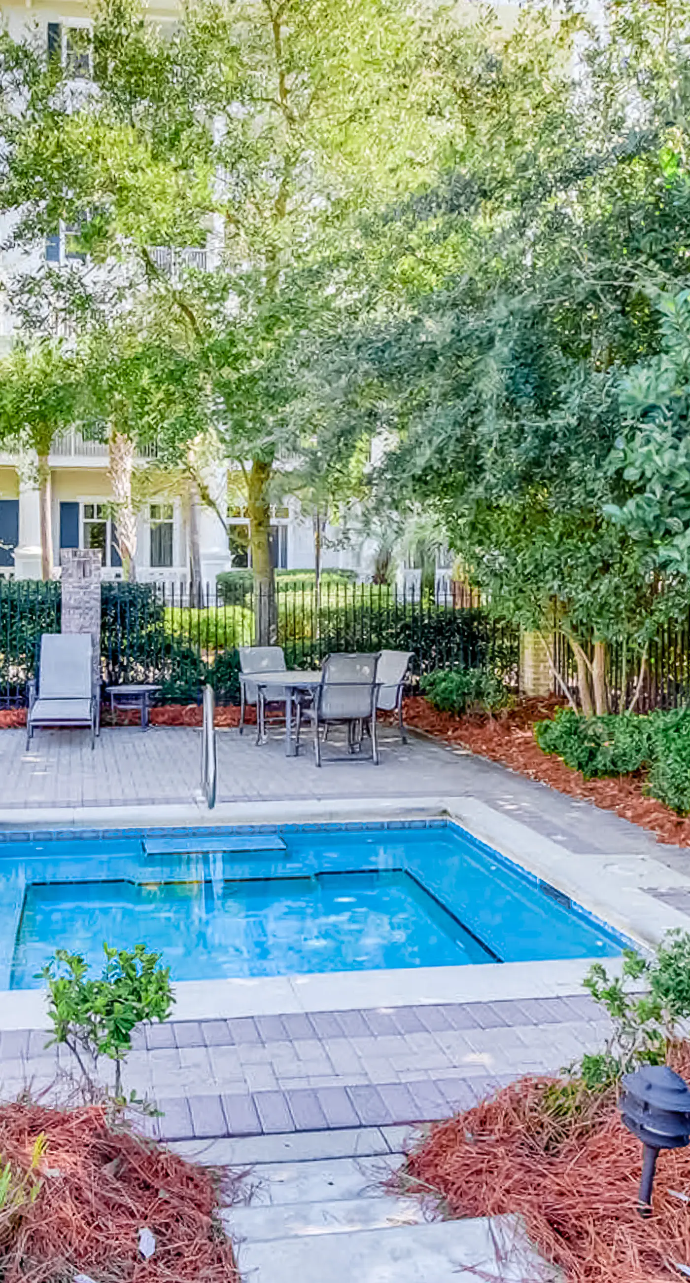 2nd-floor resort condo with balcony, on-site pool, golf, tennis & beach access