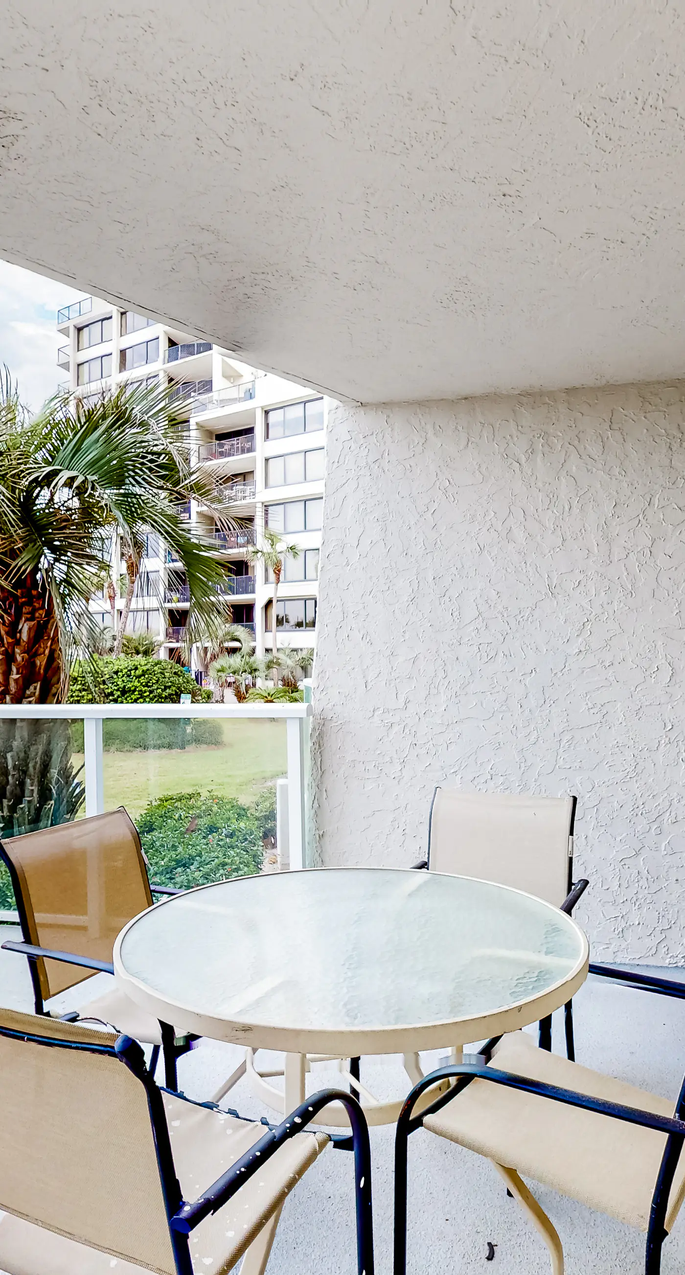 Beautiful beachfront condo with pool, beach tram, tennis, golf, & on-site dining