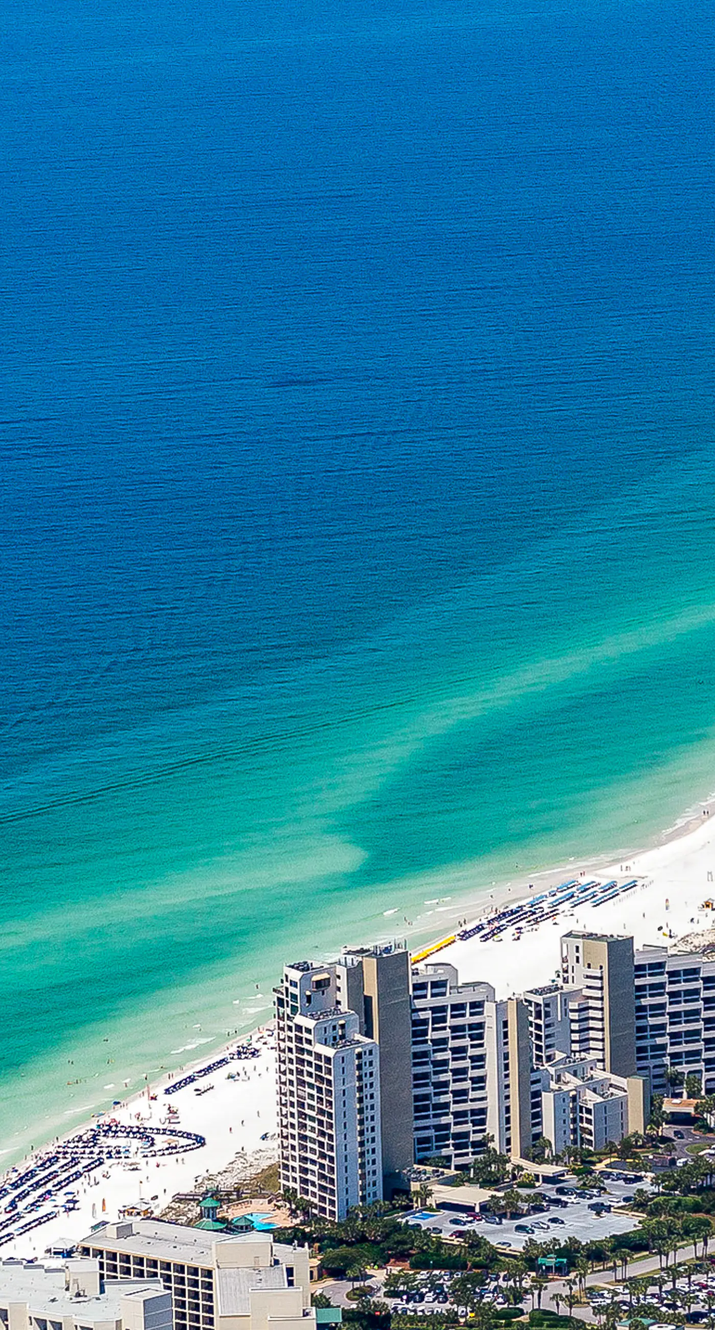 Beautiful beachfront condo with pool, beach tram, tennis, golf, & on-site dining