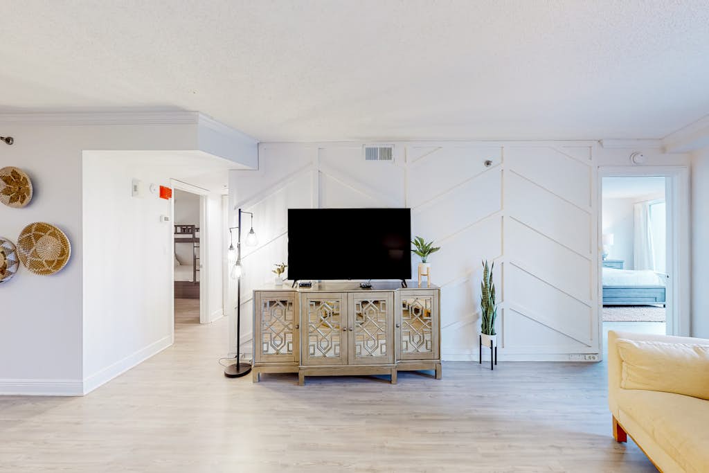 Beautiful beachfront condo with pool, beach tram, tennis, golf, & on-site dining