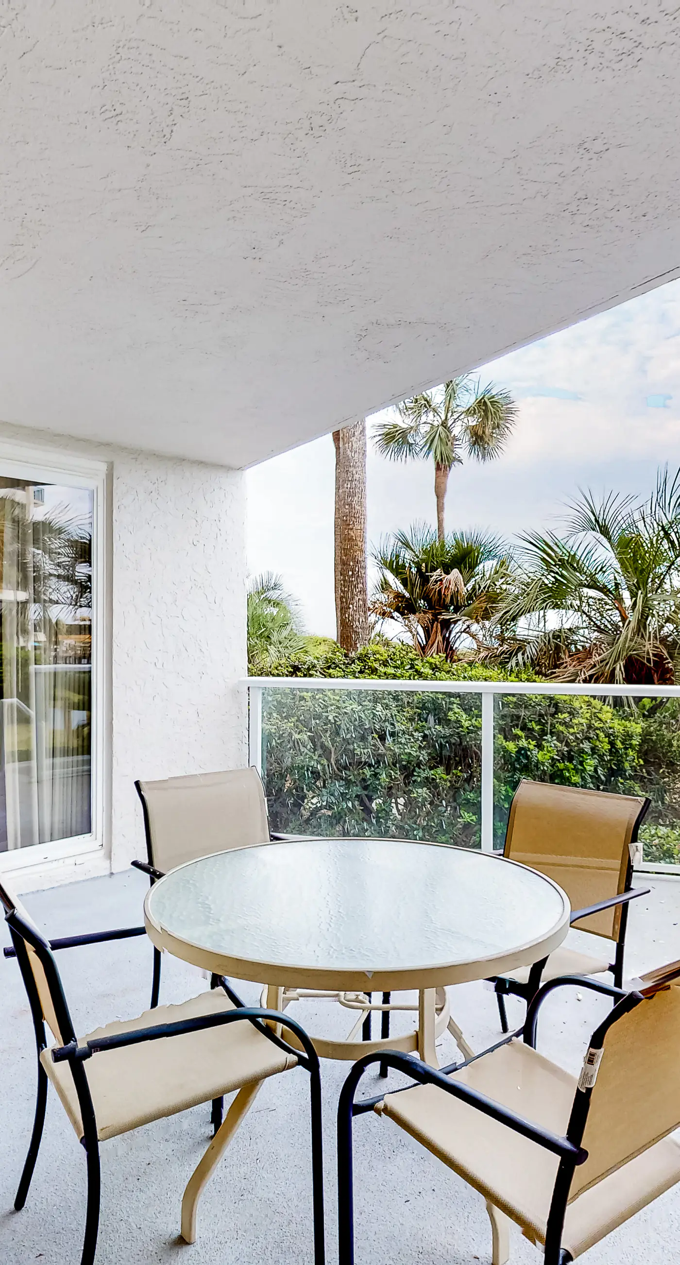 Beautiful beachfront condo with pool, beach tram, tennis, golf, & on-site dining