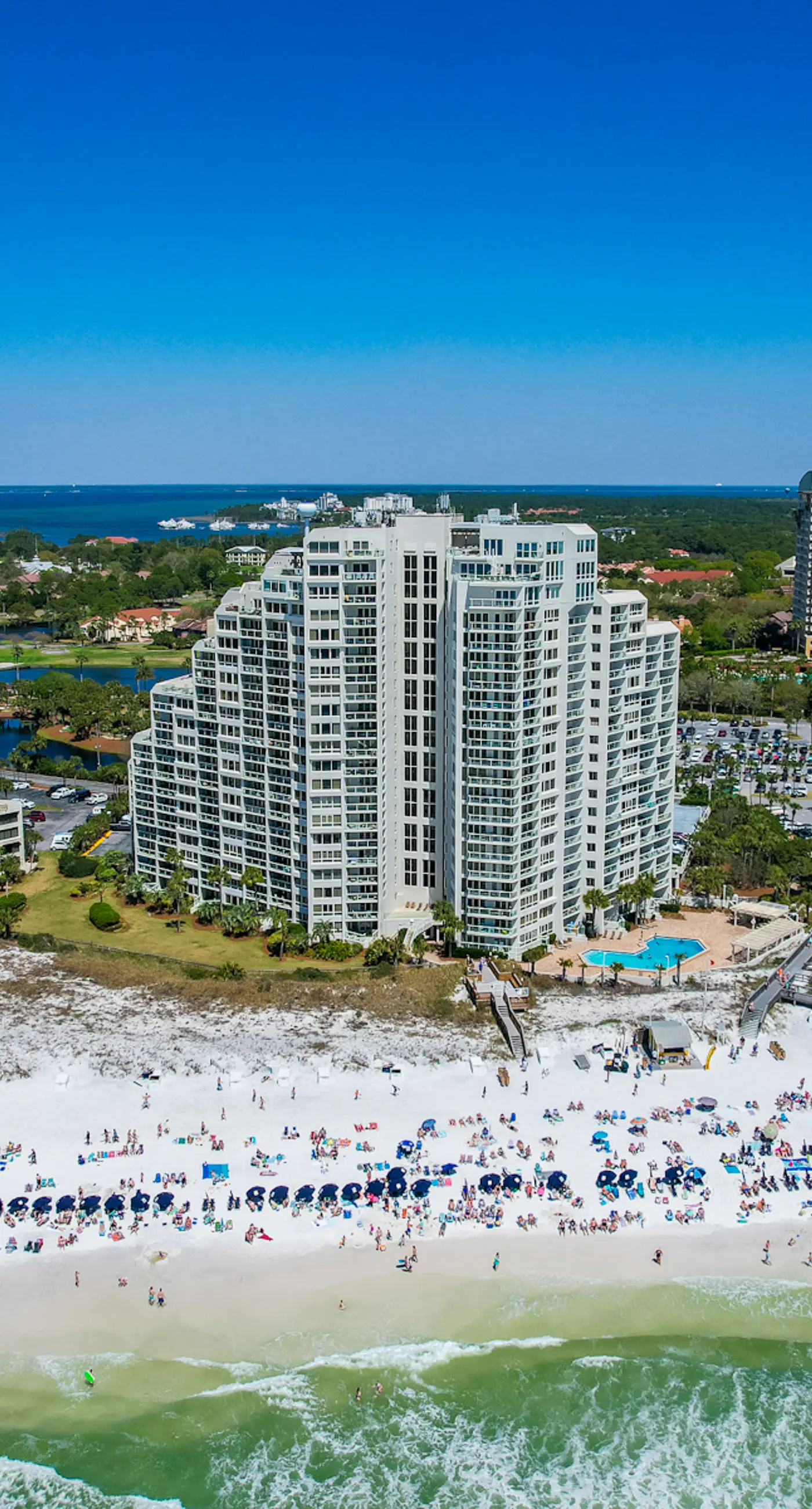 Beautiful beachfront condo with pool, beach tram, tennis, golf, & on-site dining