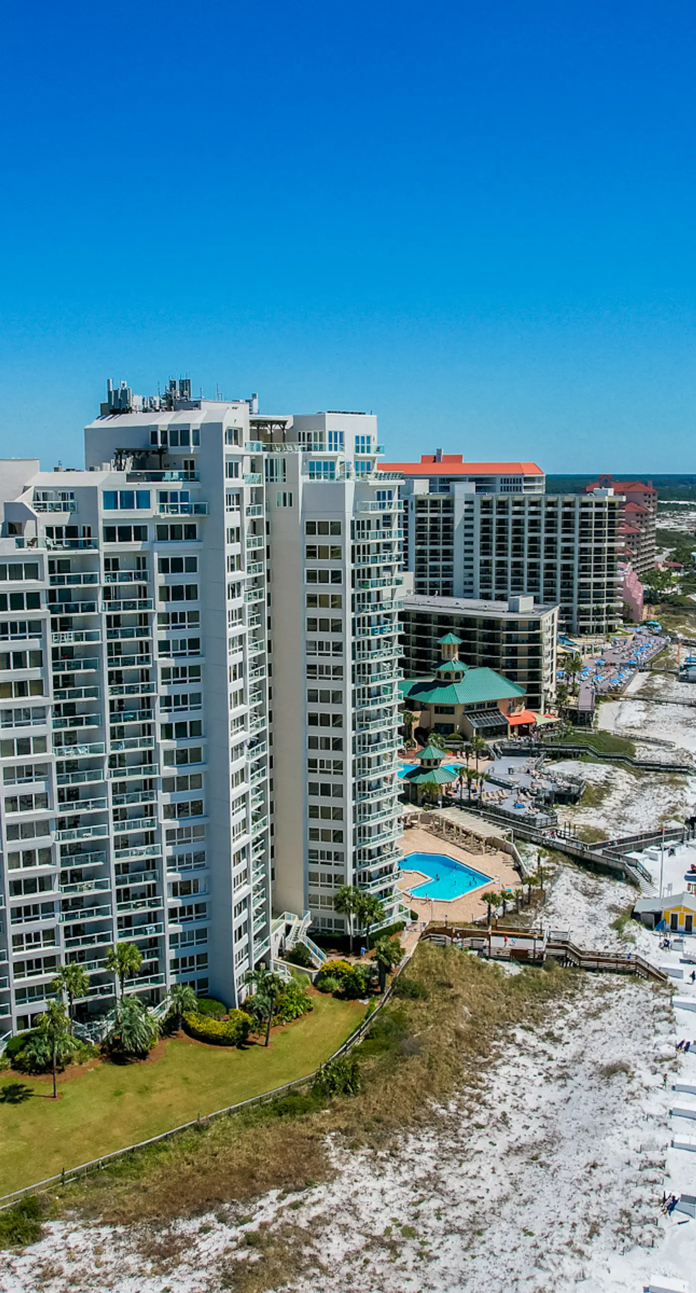 Beautiful beachfront condo with pool, beach tram, tennis, golf, & on-site dining