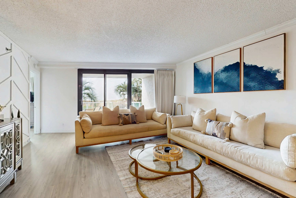 Beautiful beachfront condo with pool, beach tram, tennis, golf, & on-site dining