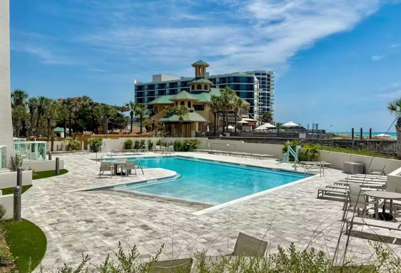Beautiful beachfront condo with pool, beach tram, tennis, golf, & on-site dining