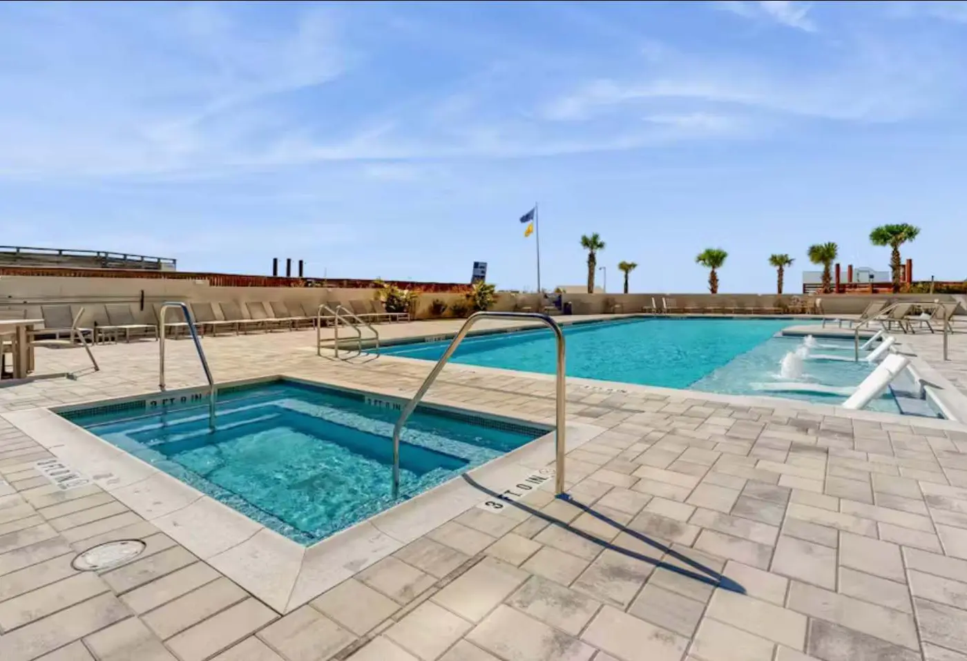 Beautiful beachfront condo with pool, beach tram, tennis, golf, & on-site dining