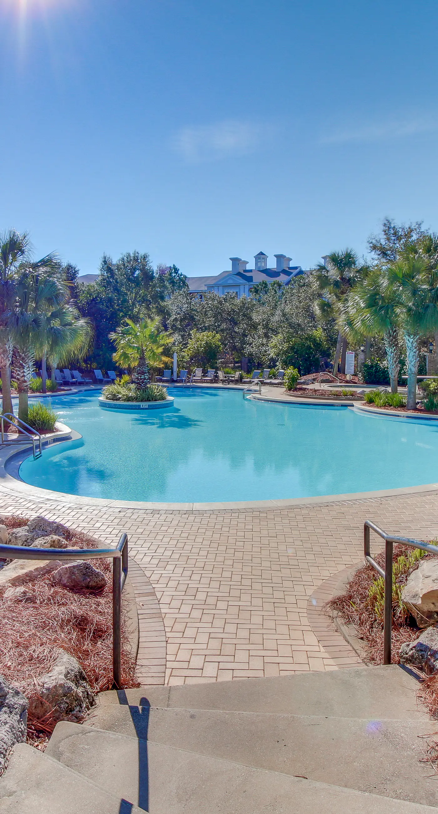 Spacious condo with bay views, renovated pool, hot tub, & beach access!