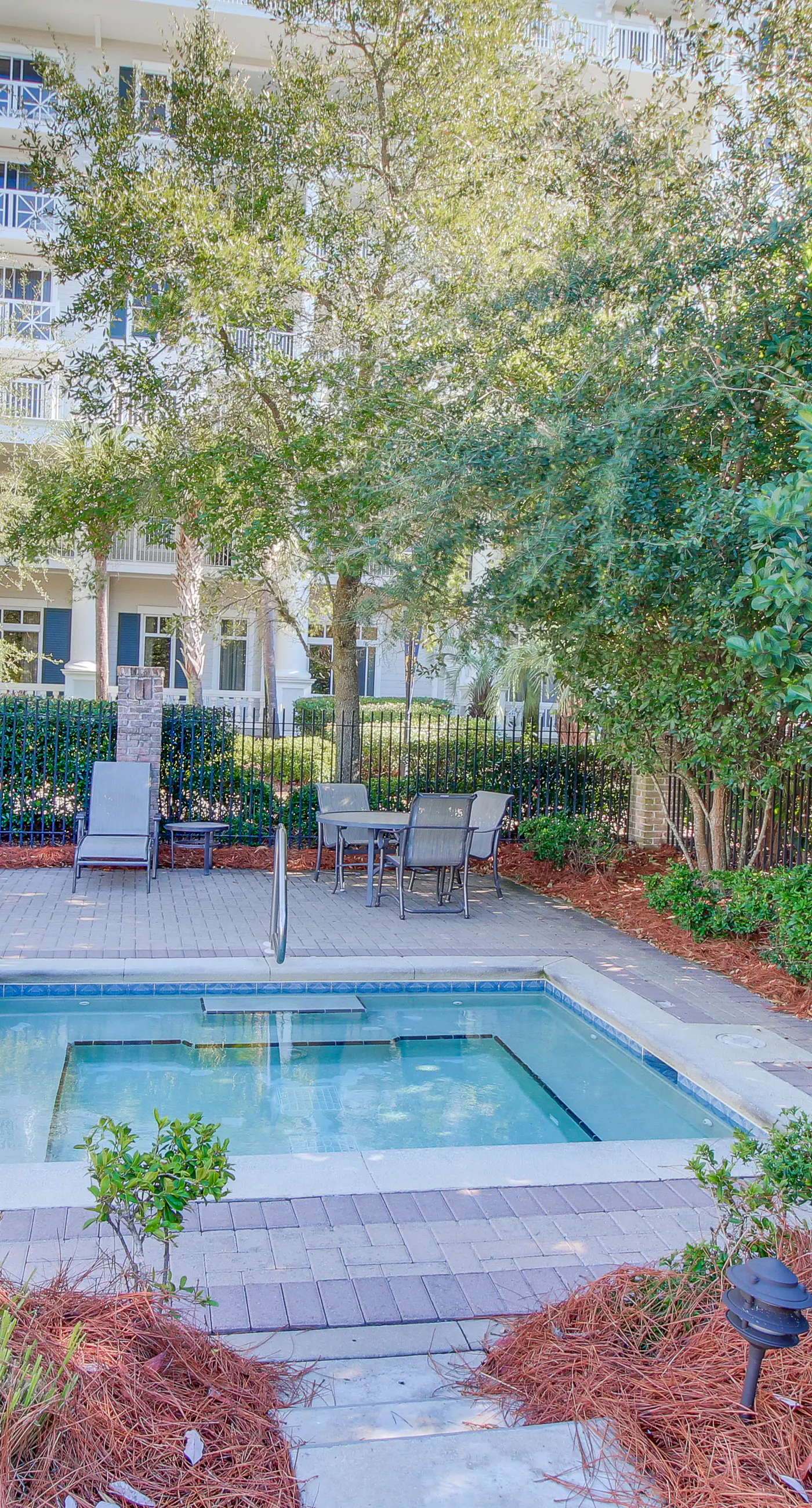 Spacious condo with bay views, renovated pool, hot tub, & beach access!