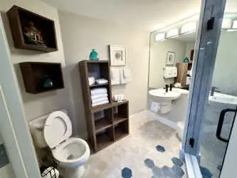 Spacious condo with bay views, renovated pool, hot tub, & beach access!