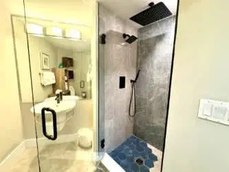 Spacious condo with bay views, renovated pool, hot tub, & beach access!