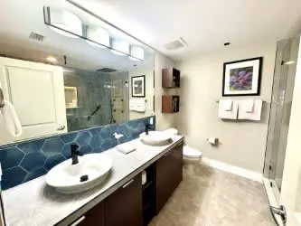 Spacious condo with bay views, renovated pool, hot tub, & beach access!