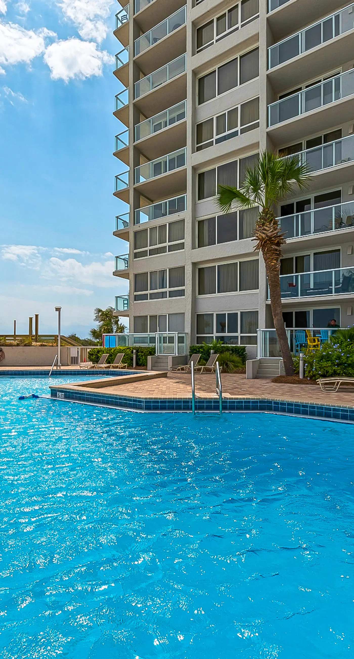 Dreamy Gulf condo with water-view balcony, pool, & beach access