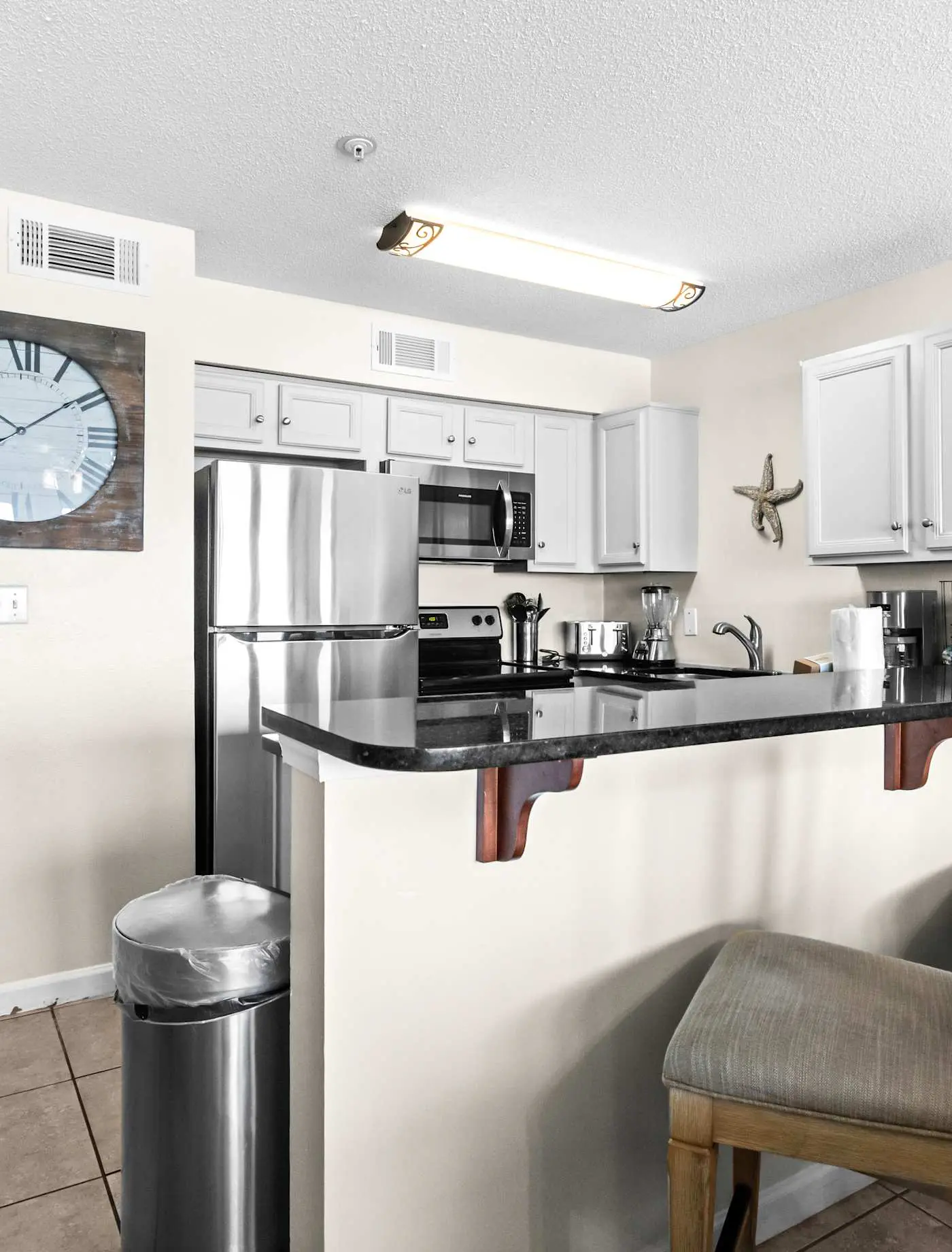 Oceanfront Condo w/ AC, WiFi, Shared Pool, & Seasonal Beach Service Rentals