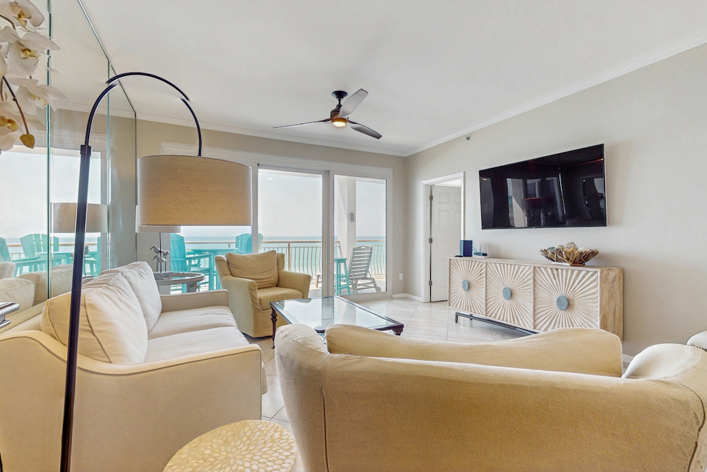 Open-concept beachfront home with balcony, lagoon pool, beach access, pickleball