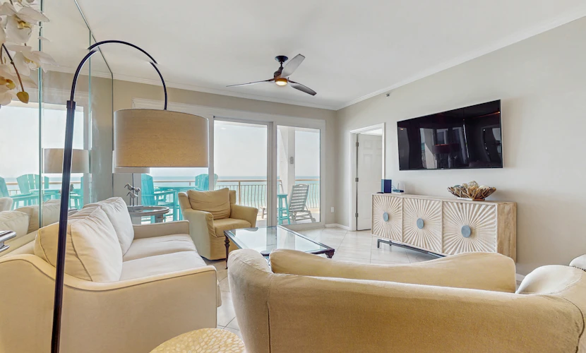 Open-concept beachfront home with balcony, lagoon pool, beach access, pickleball