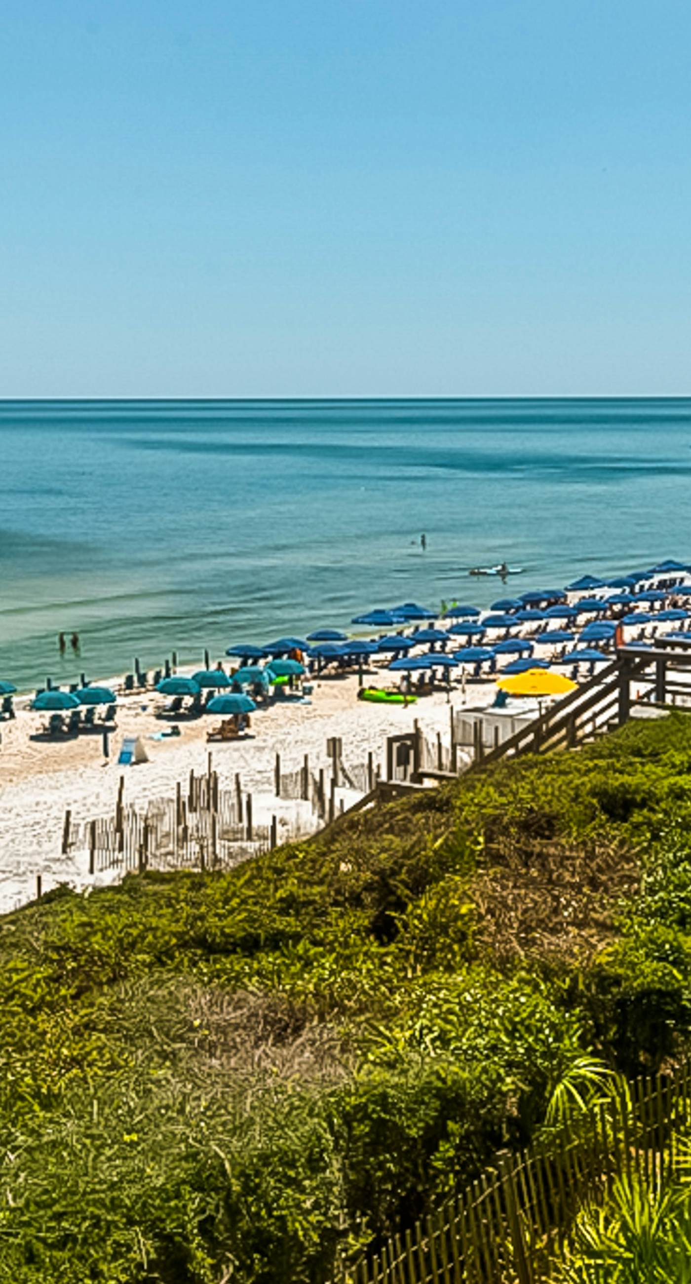 Open-concept beachfront home with balcony, lagoon pool, beach access, pickleball