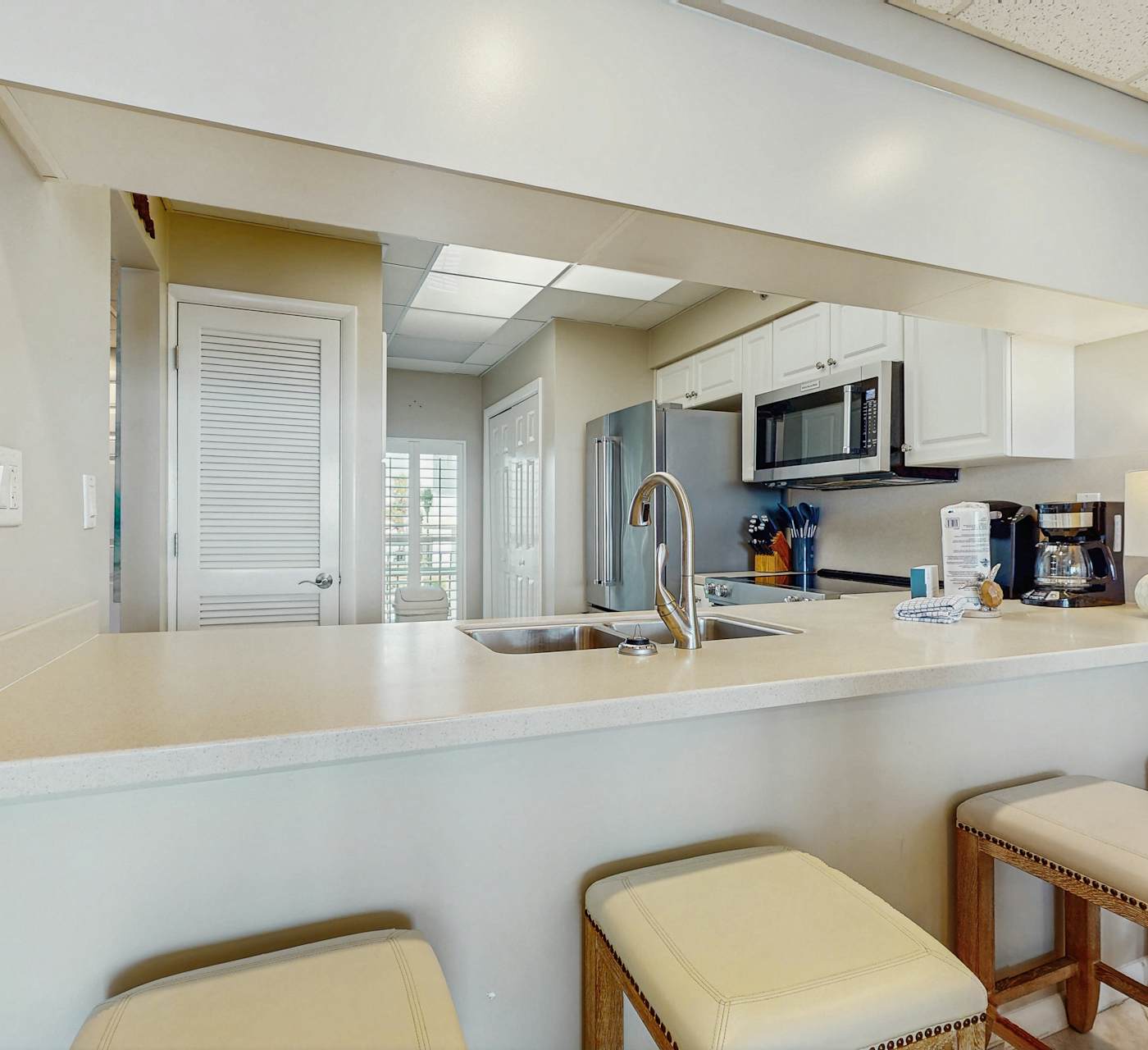 Open-concept beachfront home with balcony, lagoon pool ...