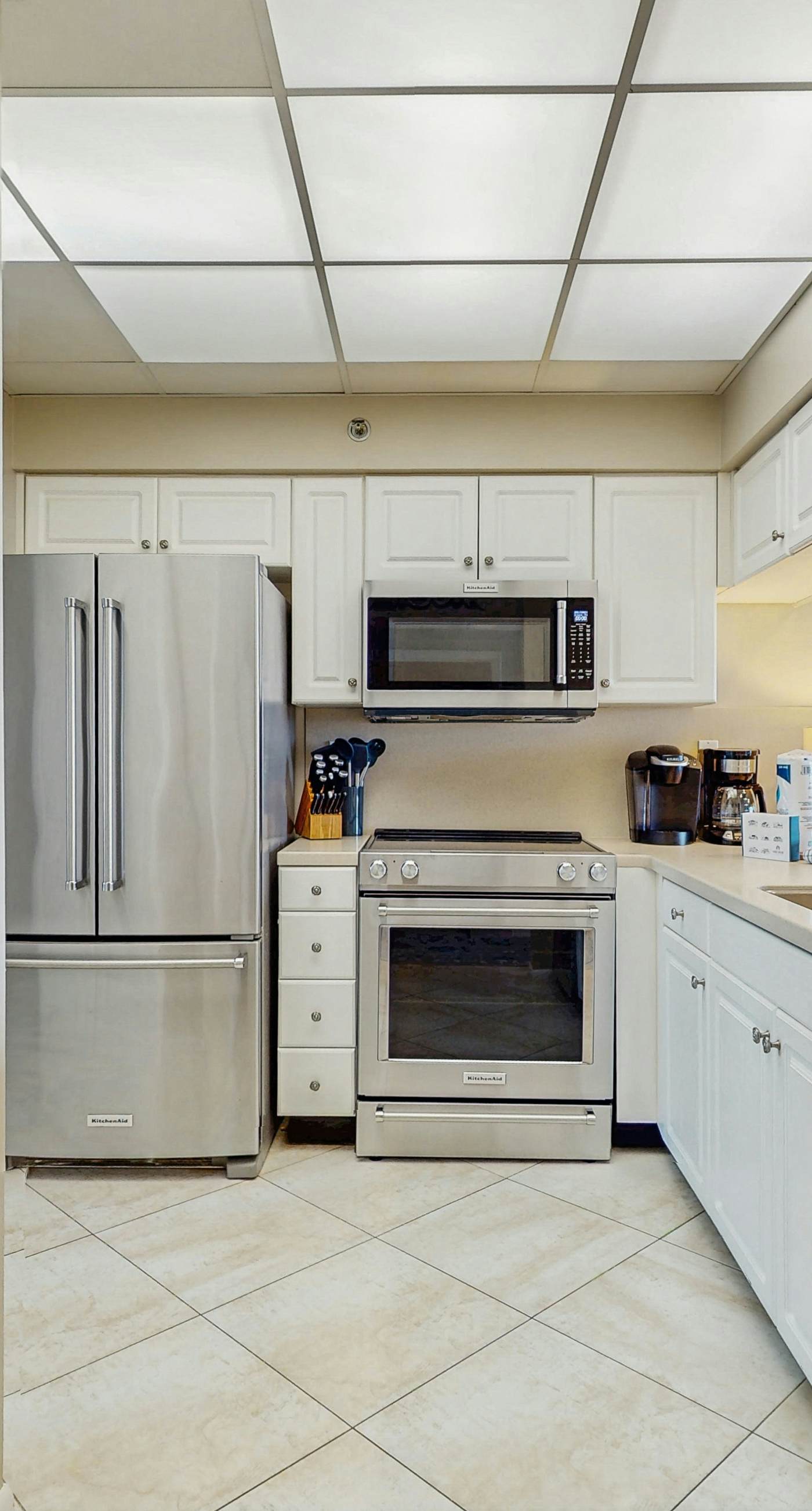 Open-concept beachfront home with balcony, lagoon pool, beach access, pickleball