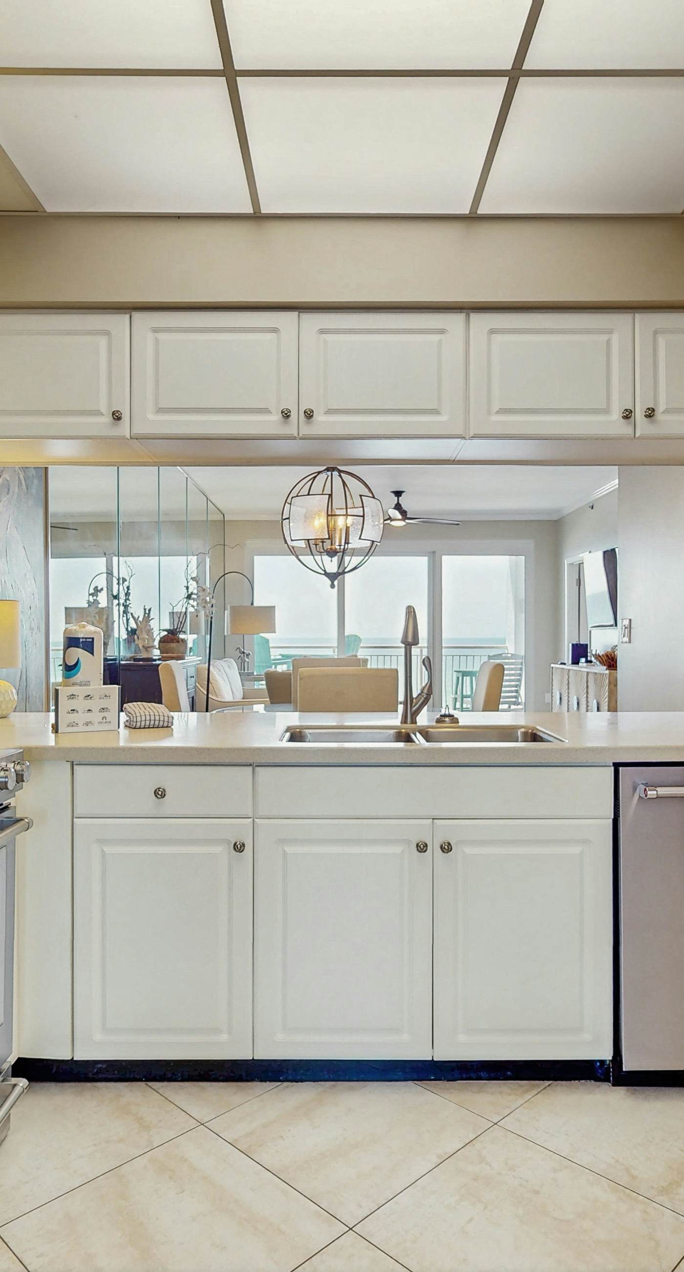 Open-concept beachfront home with balcony, lagoon pool, beach access, pickleball