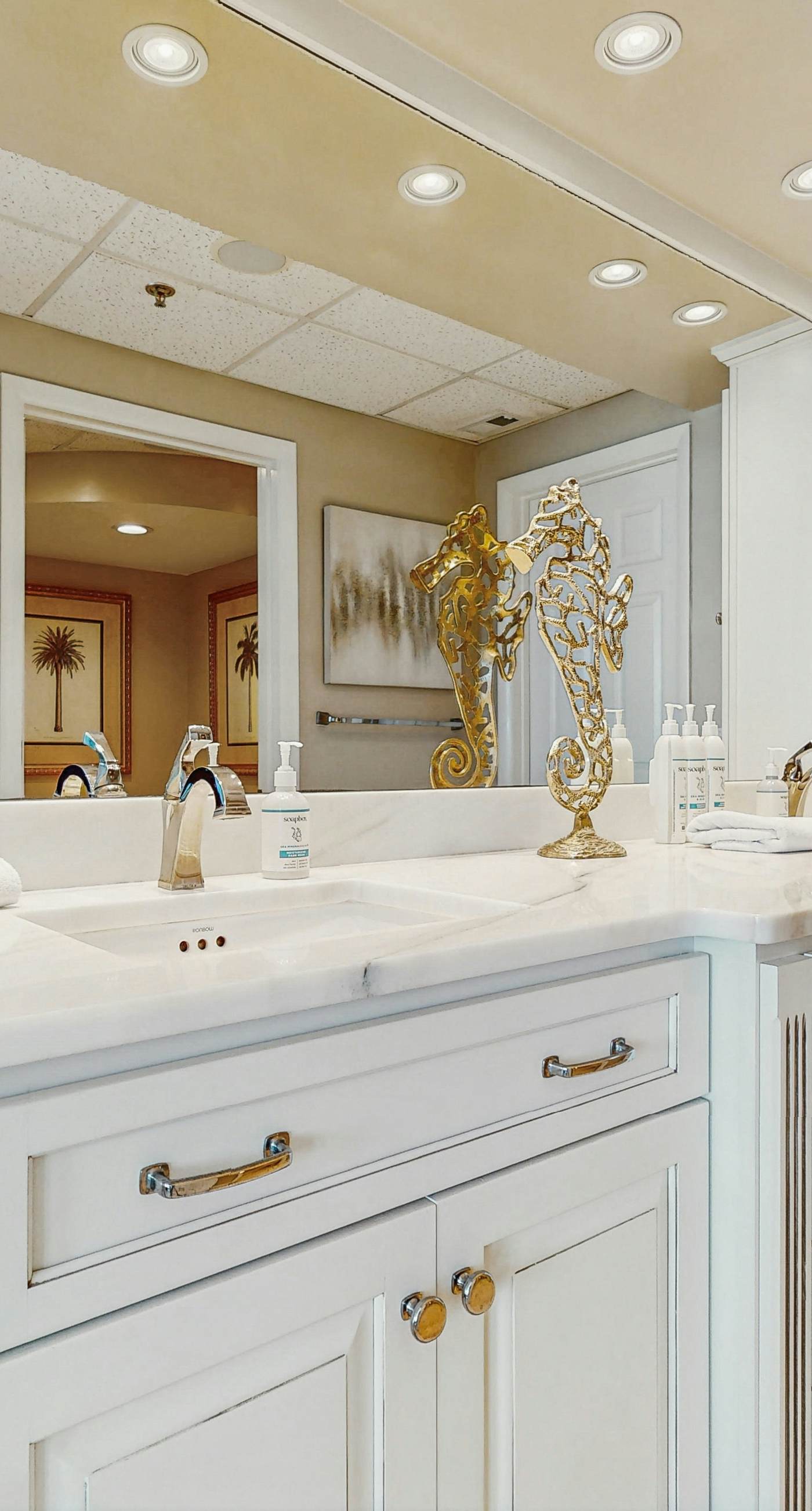 Open-concept beachfront home with balcony, lagoon pool, beach access, pickleball