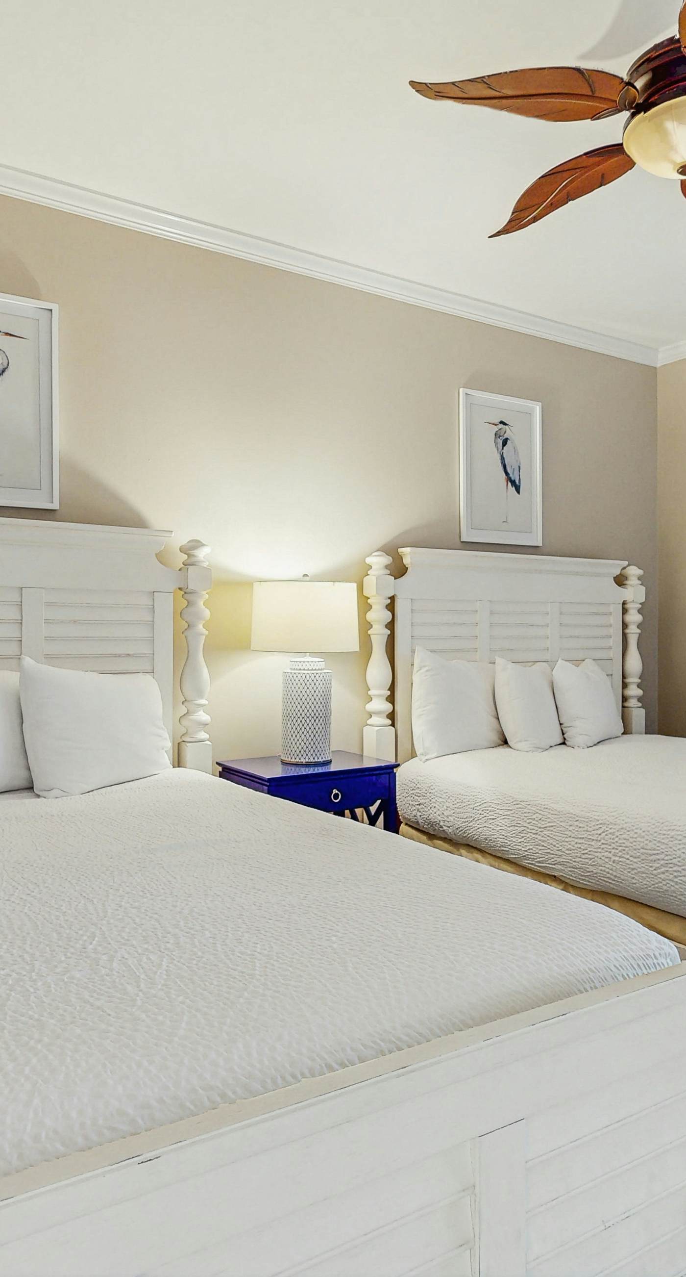 Open-concept beachfront home with balcony, lagoon pool, beach access, pickleball