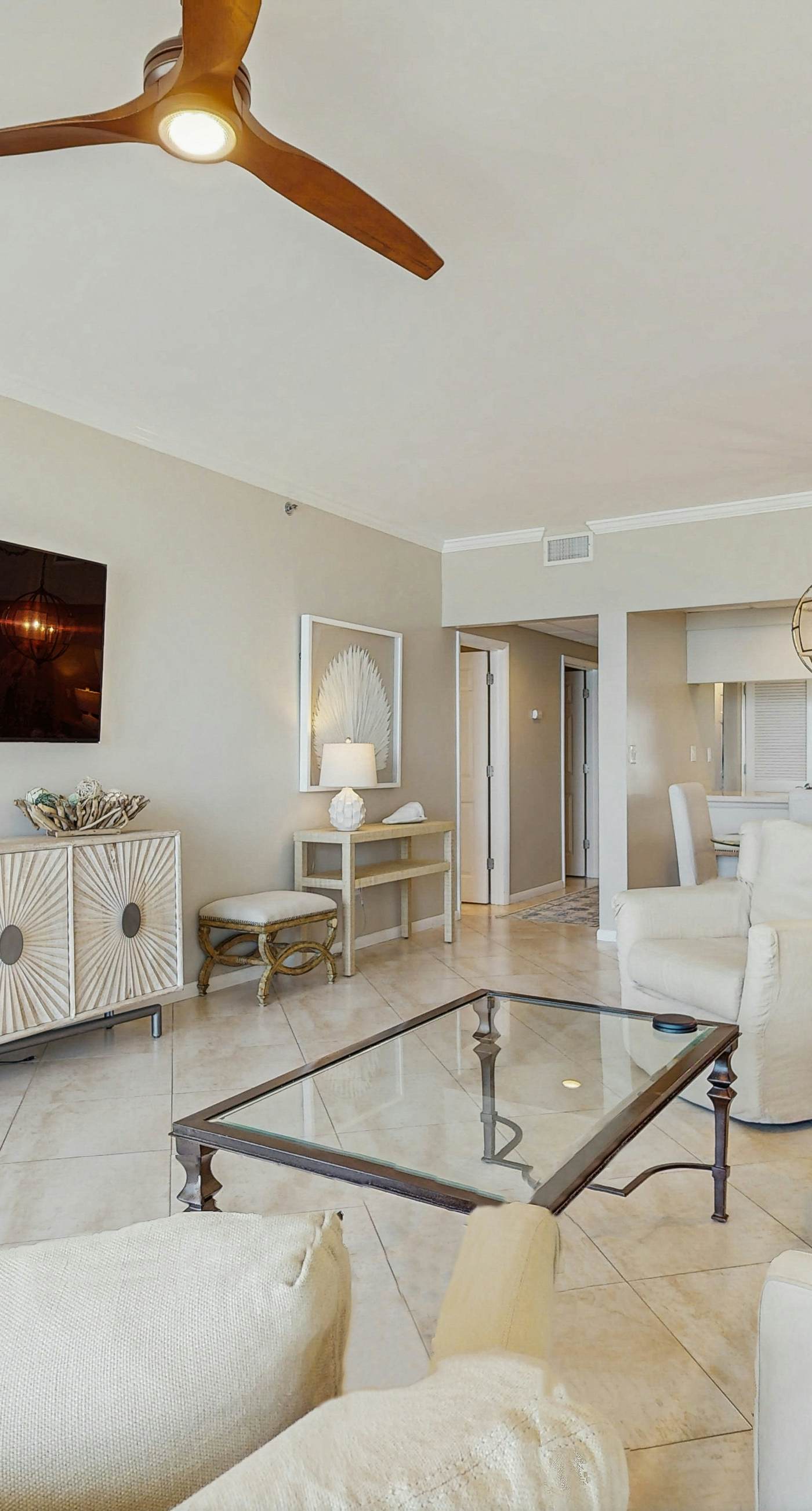 Open-concept beachfront home with balcony, lagoon pool, beach access, pickleball