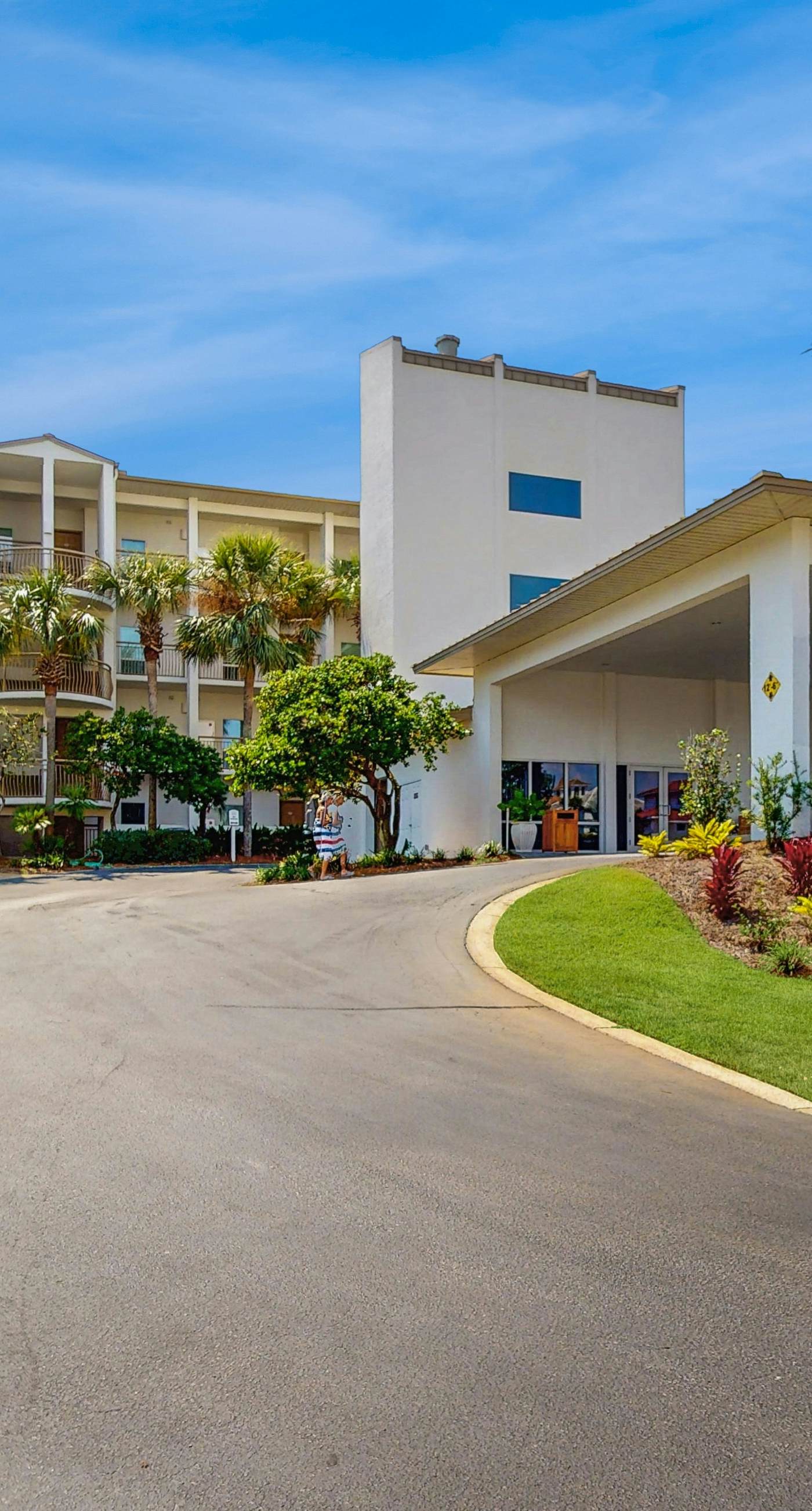 Open-concept beachfront home with balcony, lagoon pool, beach access, pickleball