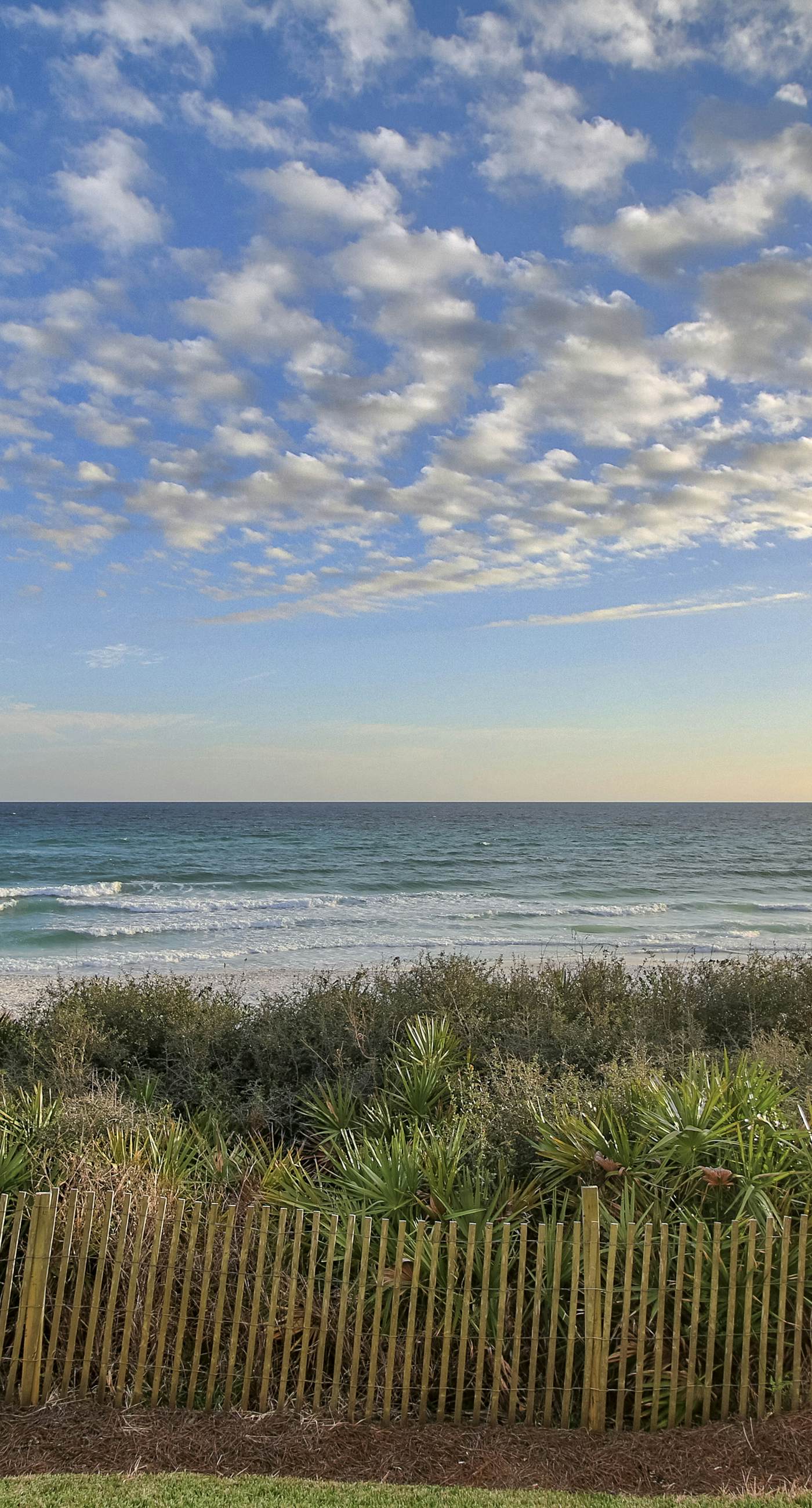 Open-concept beachfront home with balcony, lagoon pool, beach access, pickleball