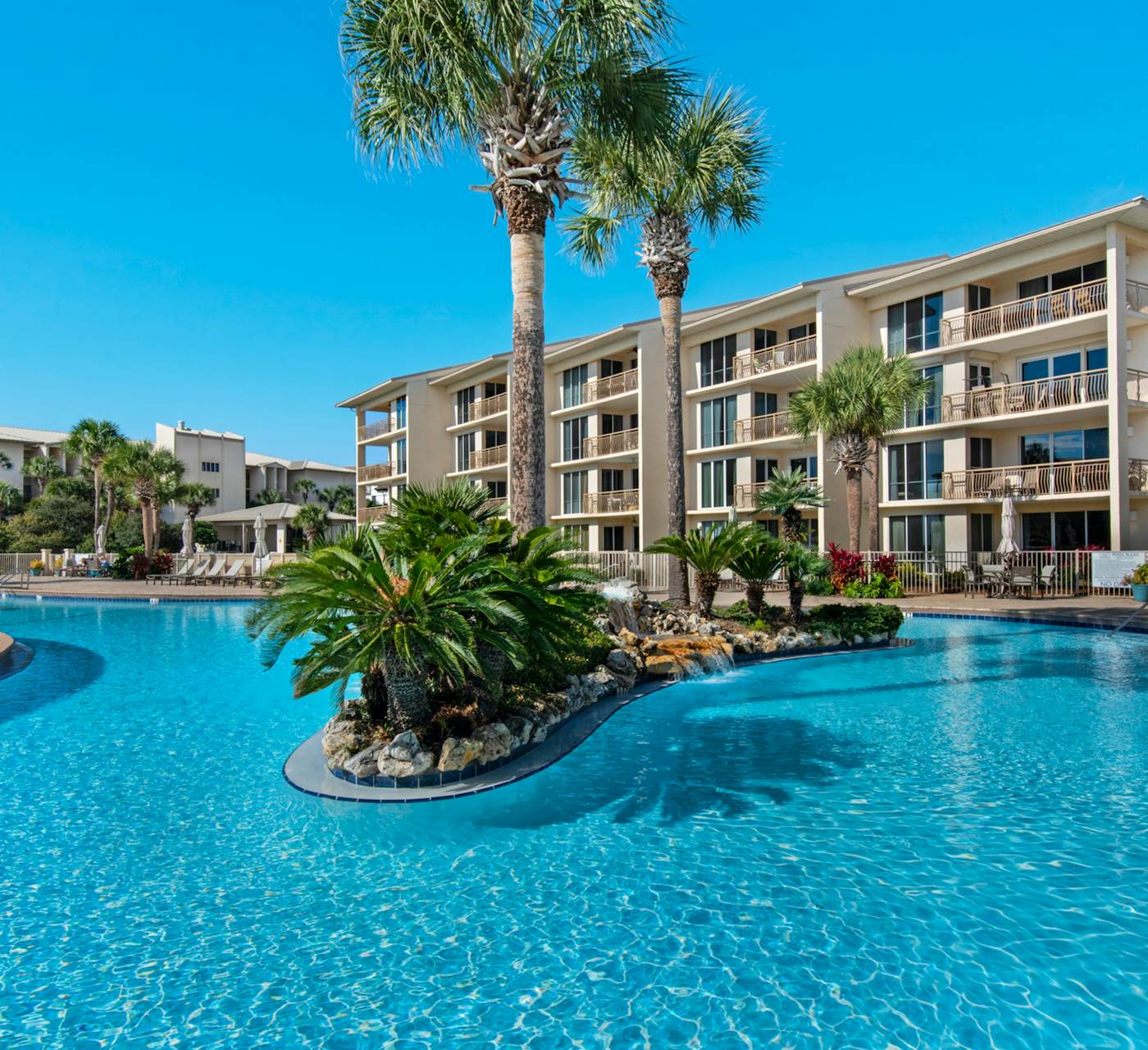 Open-concept beachfront home with balcony, lagoon pool ...
