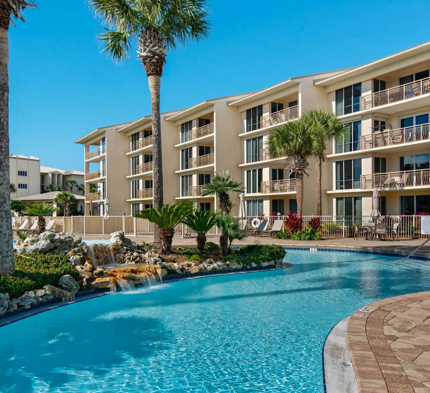 Open-concept beachfront home with balcony, lagoon pool ...