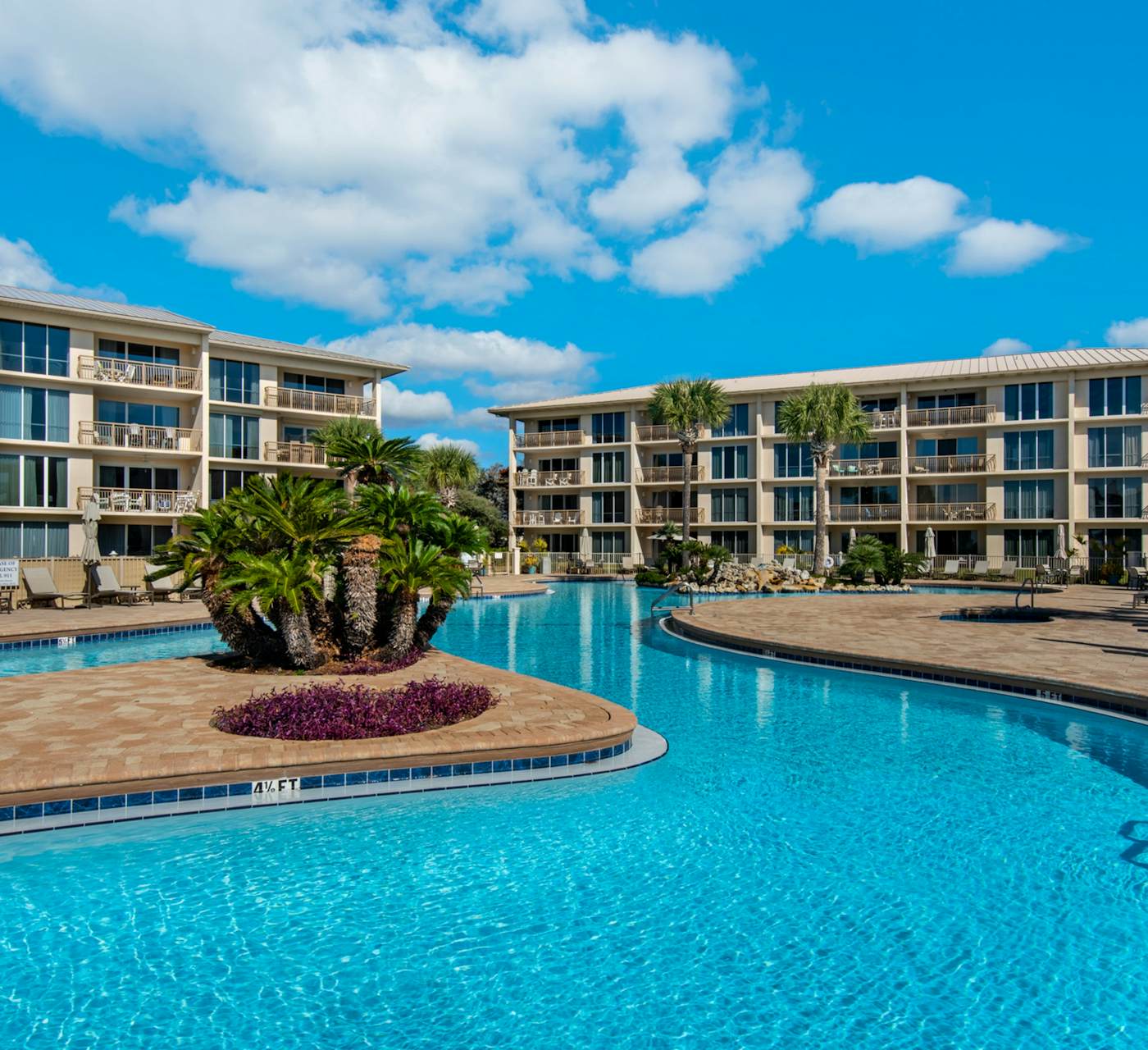 Open-concept beachfront home with balcony, lagoon pool ...