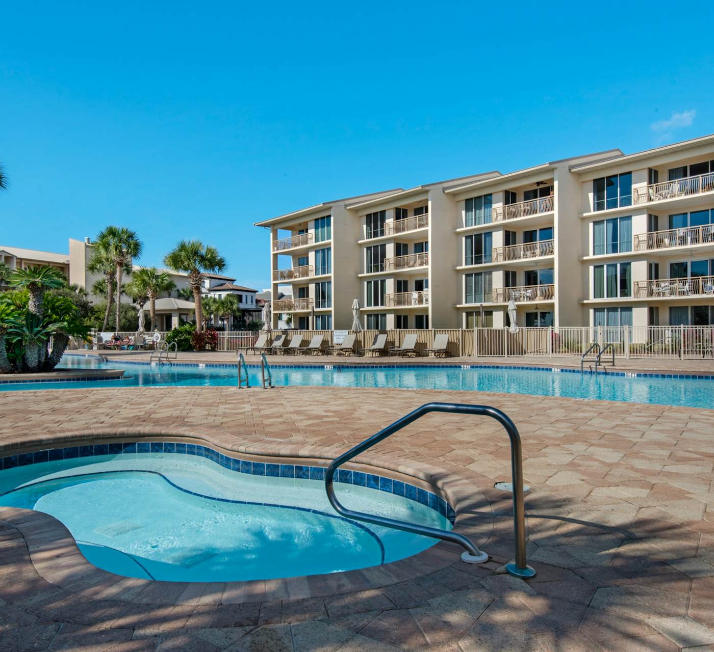Open-concept beachfront home with balcony, lagoon pool ...