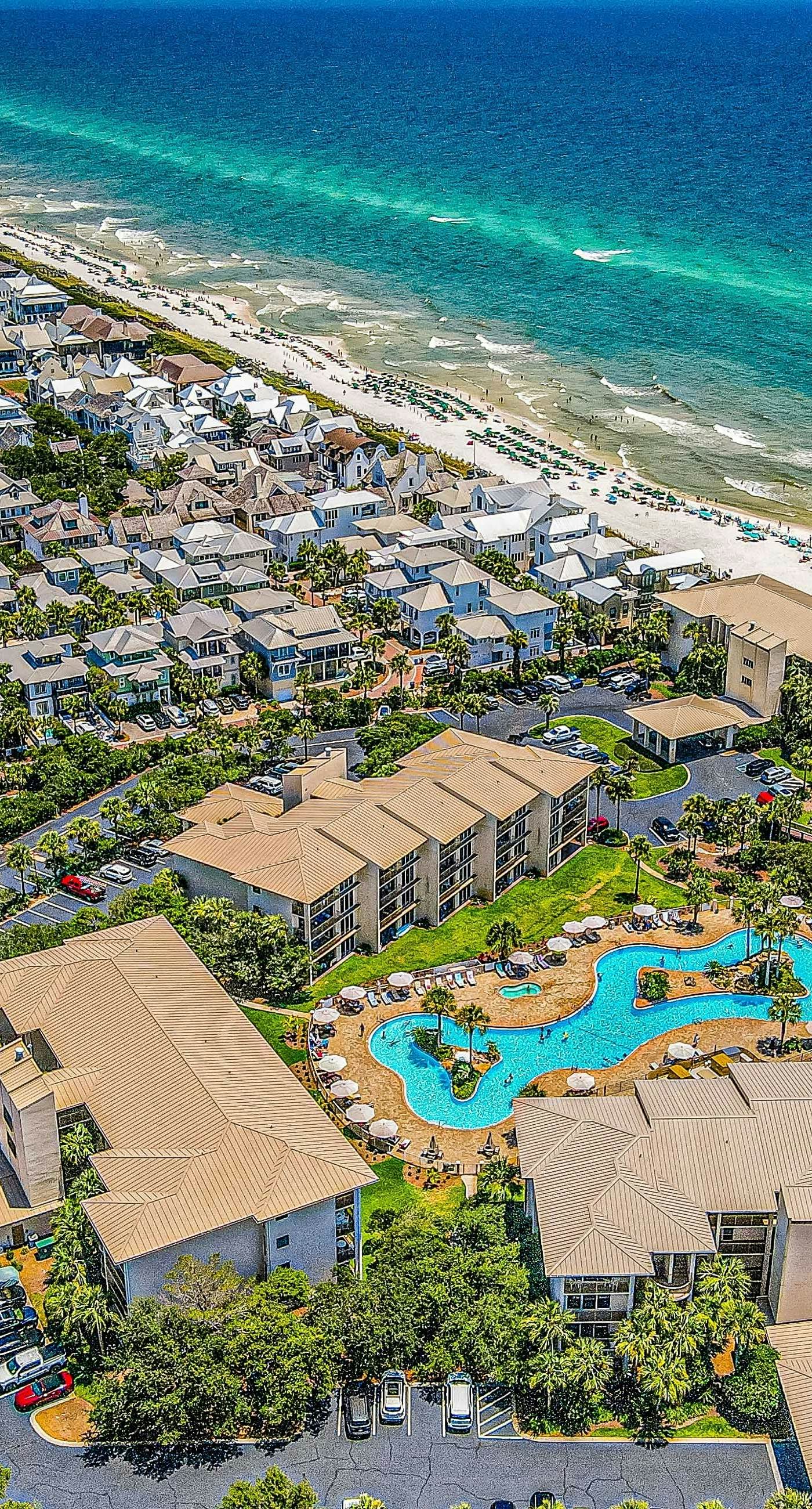 Open-concept beachfront home with balcony, lagoon pool, beach access, pickleball