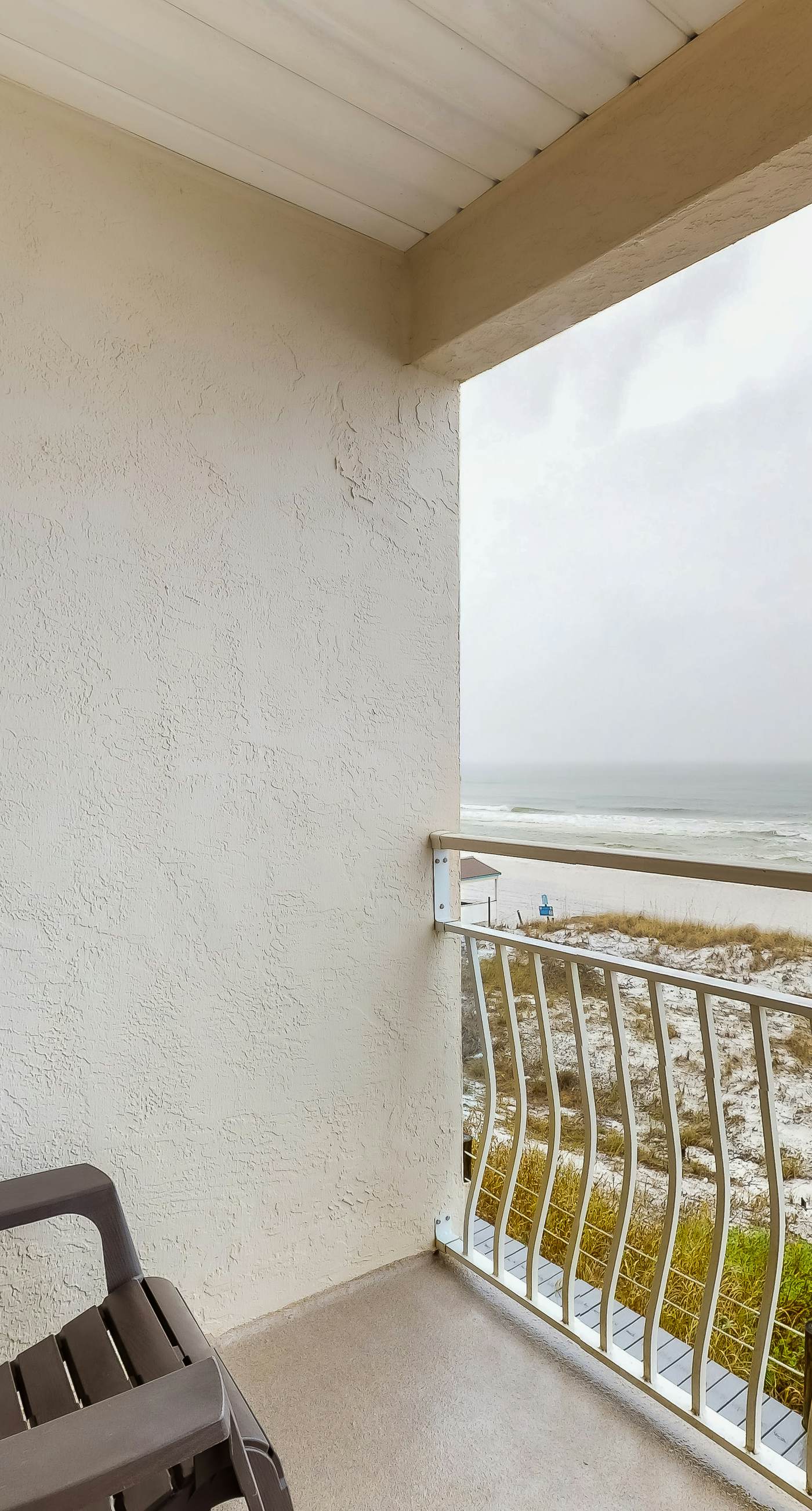 Oceanfront Condo with AC, WiFi, Shared Pool, & Seasonal Beach Service Rentals