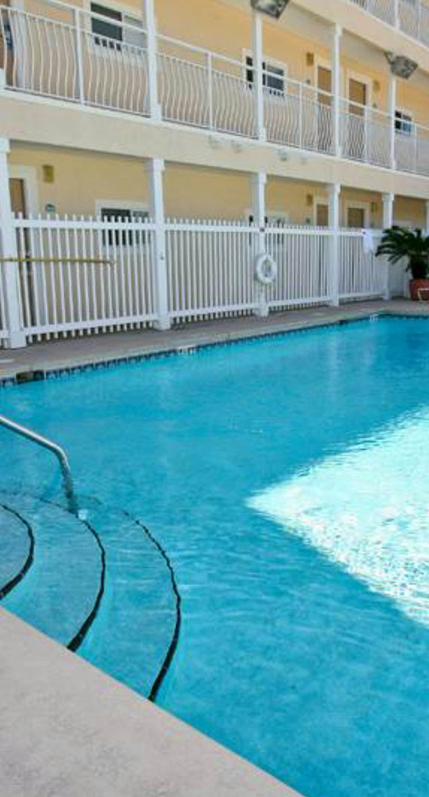 Oceanfront Condo with AC, WiFi, Shared Pool, & Seasonal Beach Service Rentals