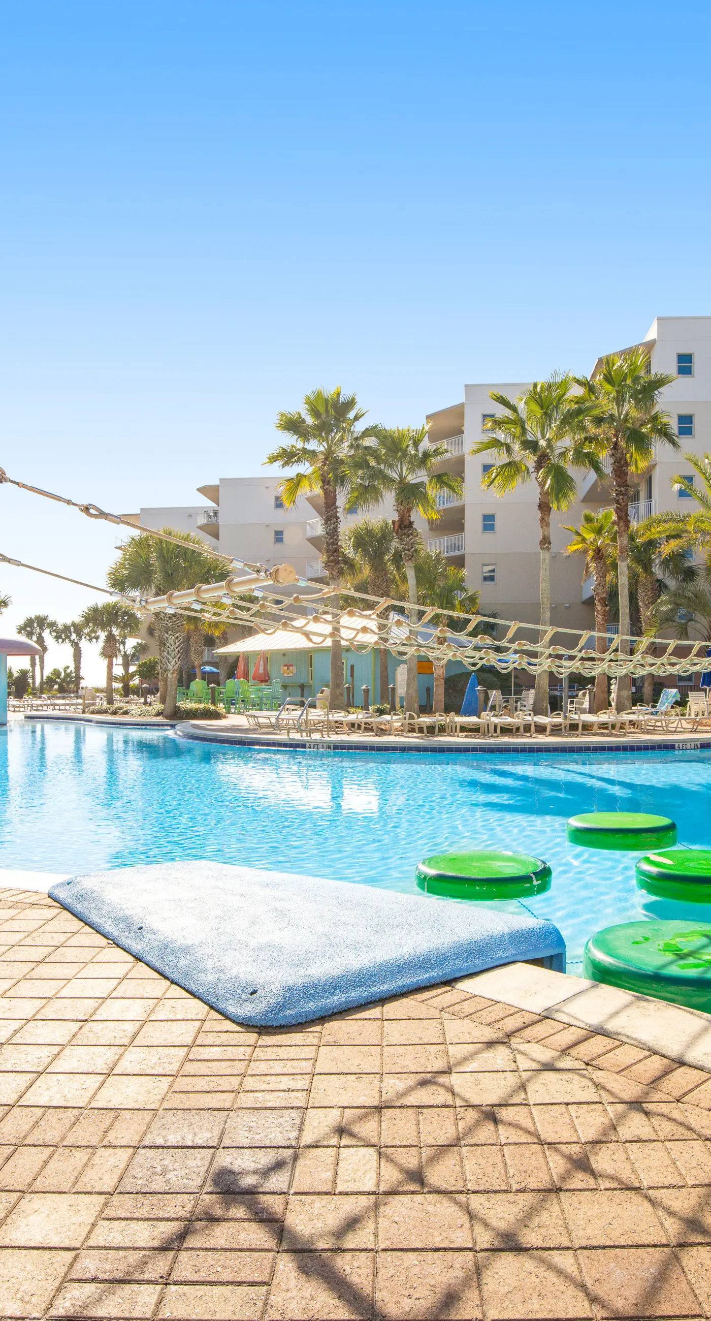 Elegant oceanfront condo with Gulf views, central AC, and shared pool & hot tub