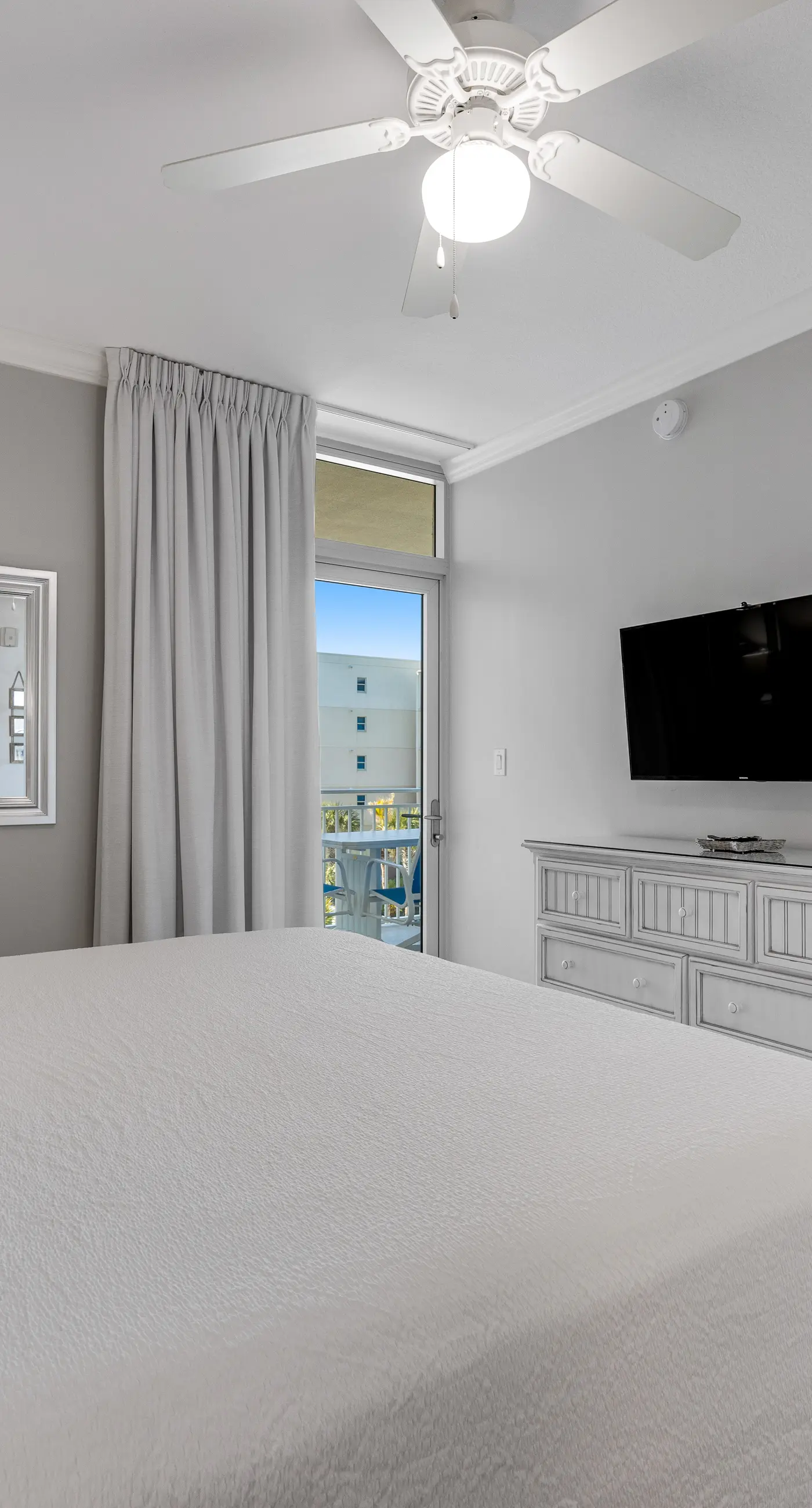 Elegant oceanfront condo with Gulf views, central AC, and shared pool & hot tub