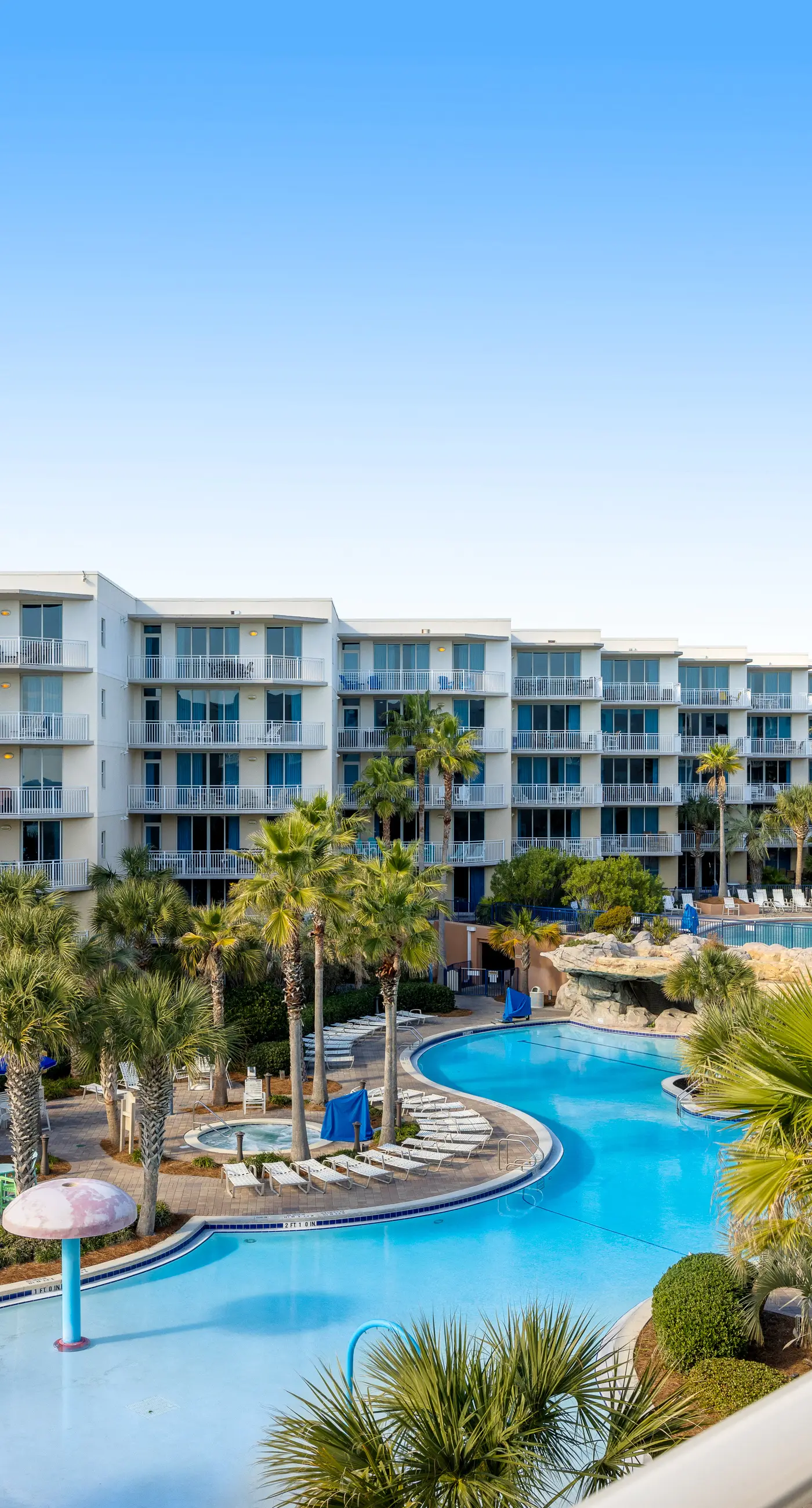 Elegant oceanfront condo with Gulf views, central AC, and shared pool & hot tub