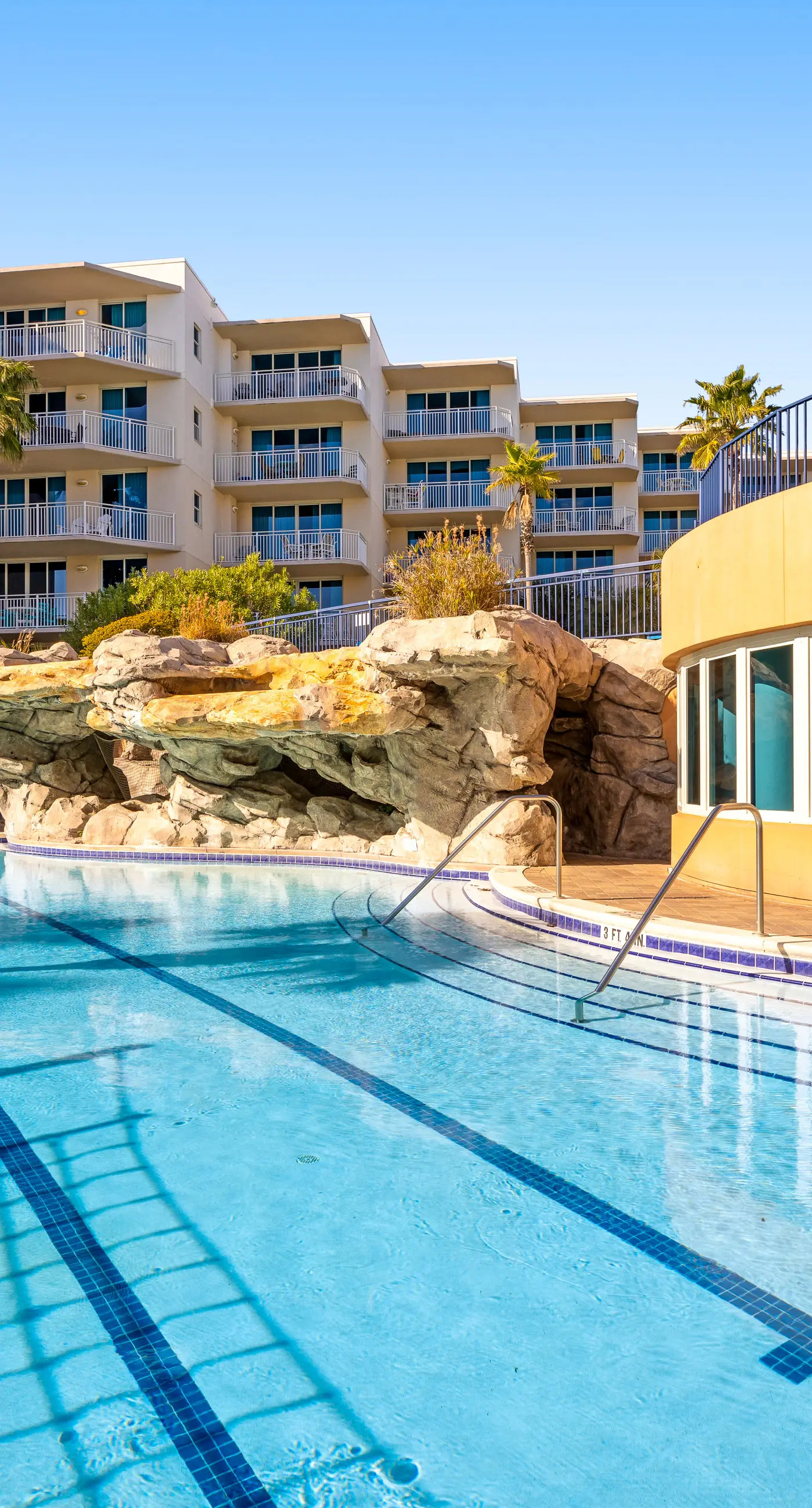 Elegant oceanfront condo with Gulf views, central AC, and shared pool & hot tub