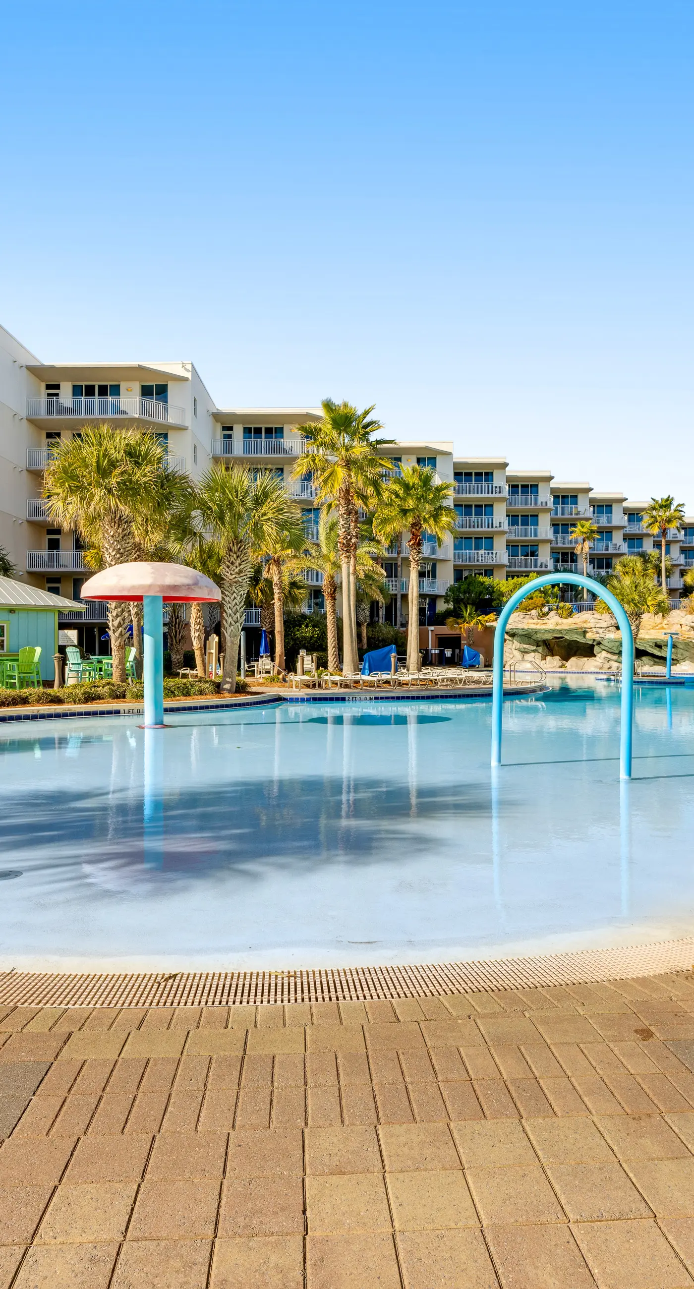 Elegant oceanfront condo with Gulf views, central AC, and shared pool & hot tub