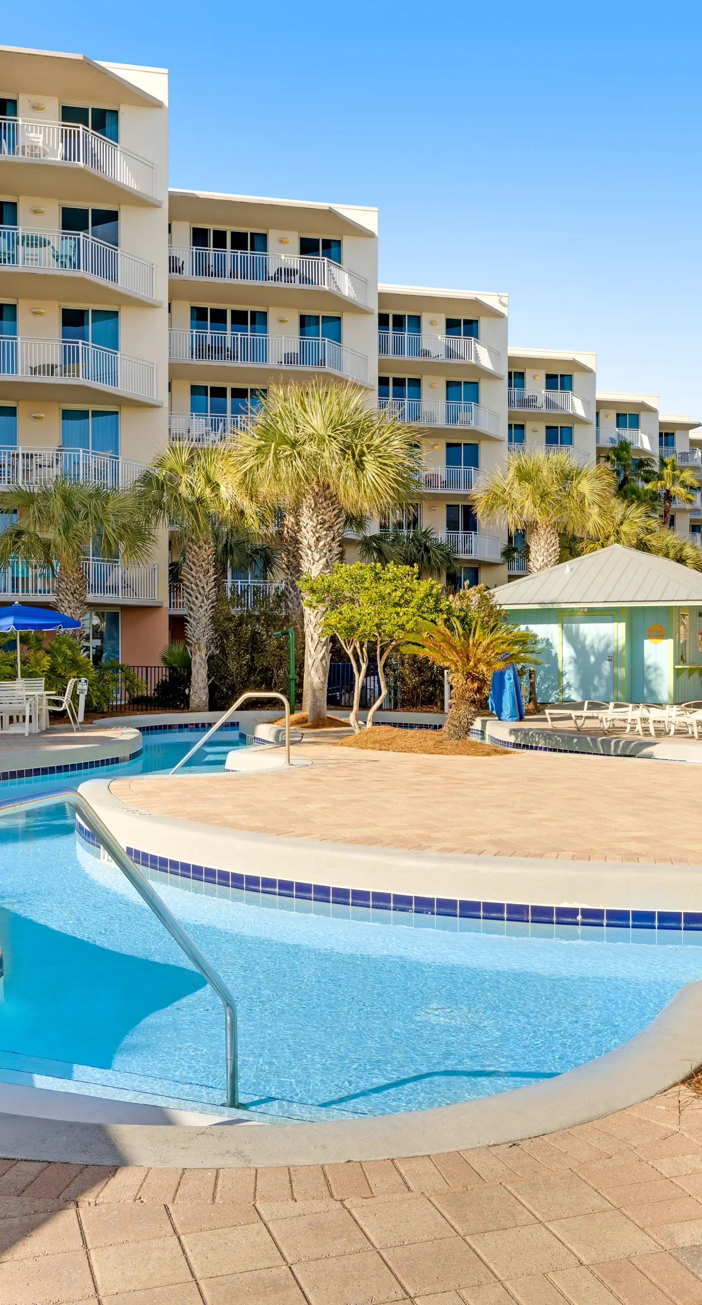 Elegant oceanfront condo with Gulf views, central AC, and shared pool & hot tub