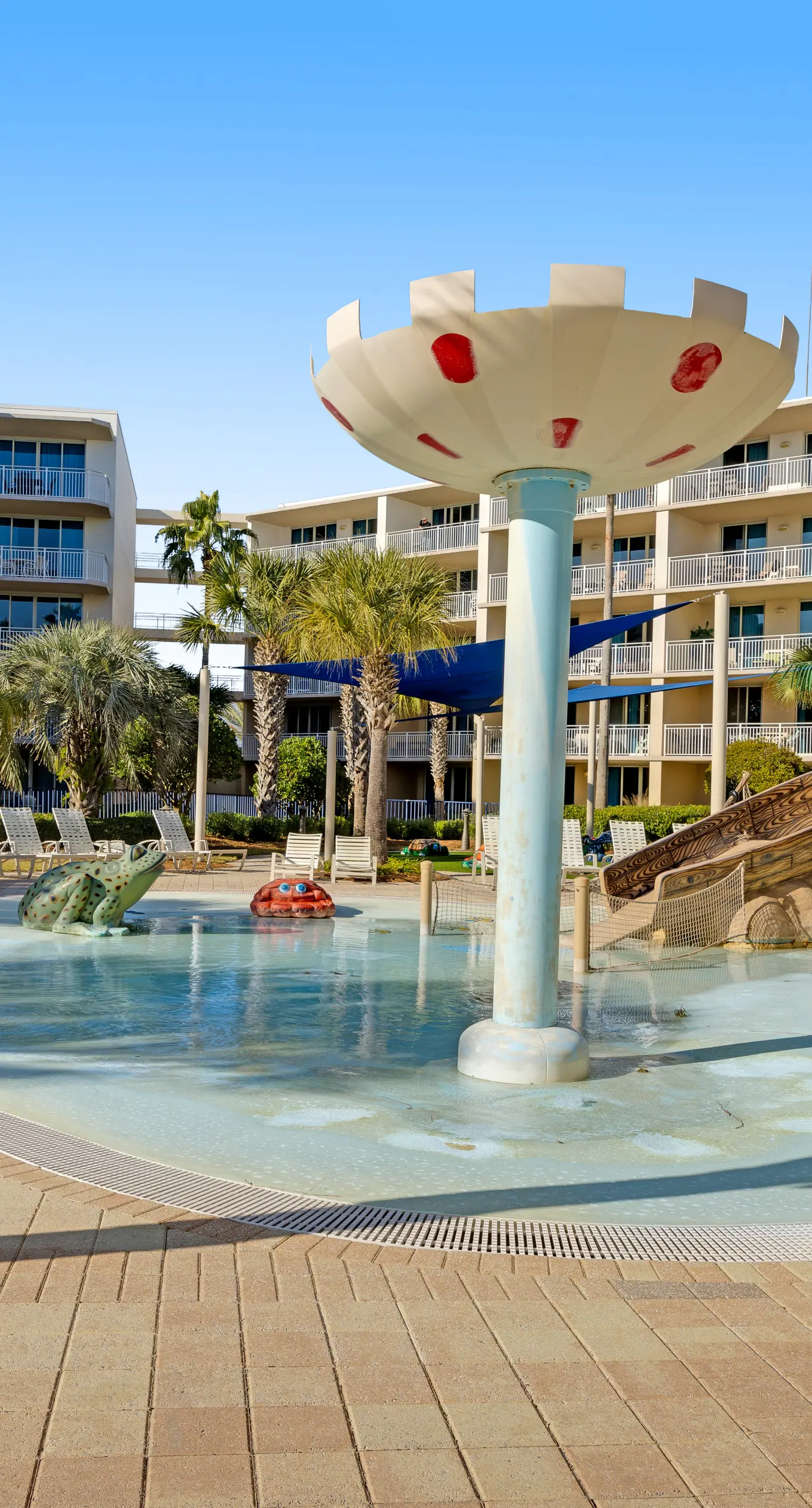Elegant oceanfront condo with Gulf views, central AC, and shared pool & hot tub