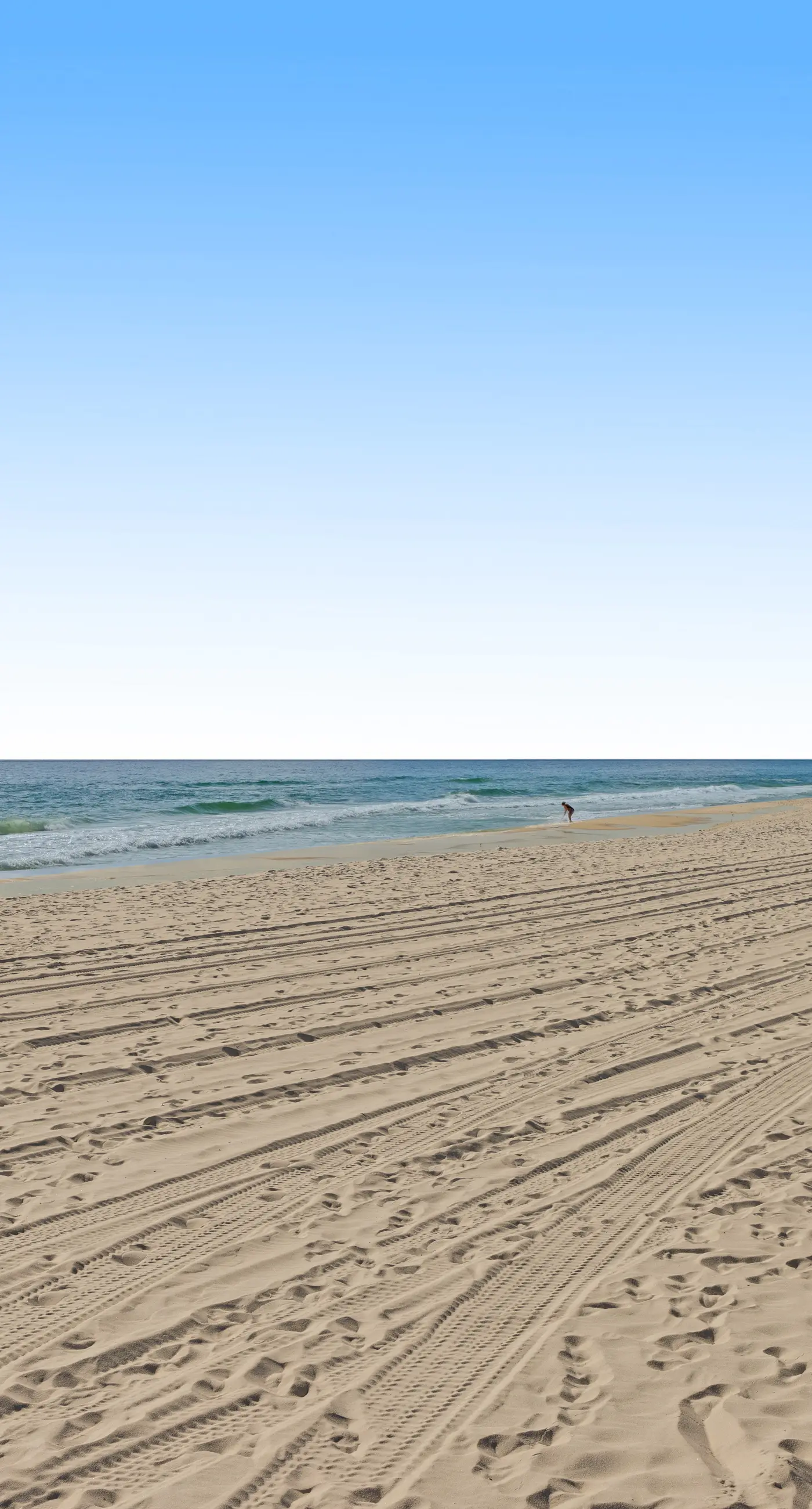 Elegant oceanfront condo with Gulf views, central AC, and shared pool & hot tub