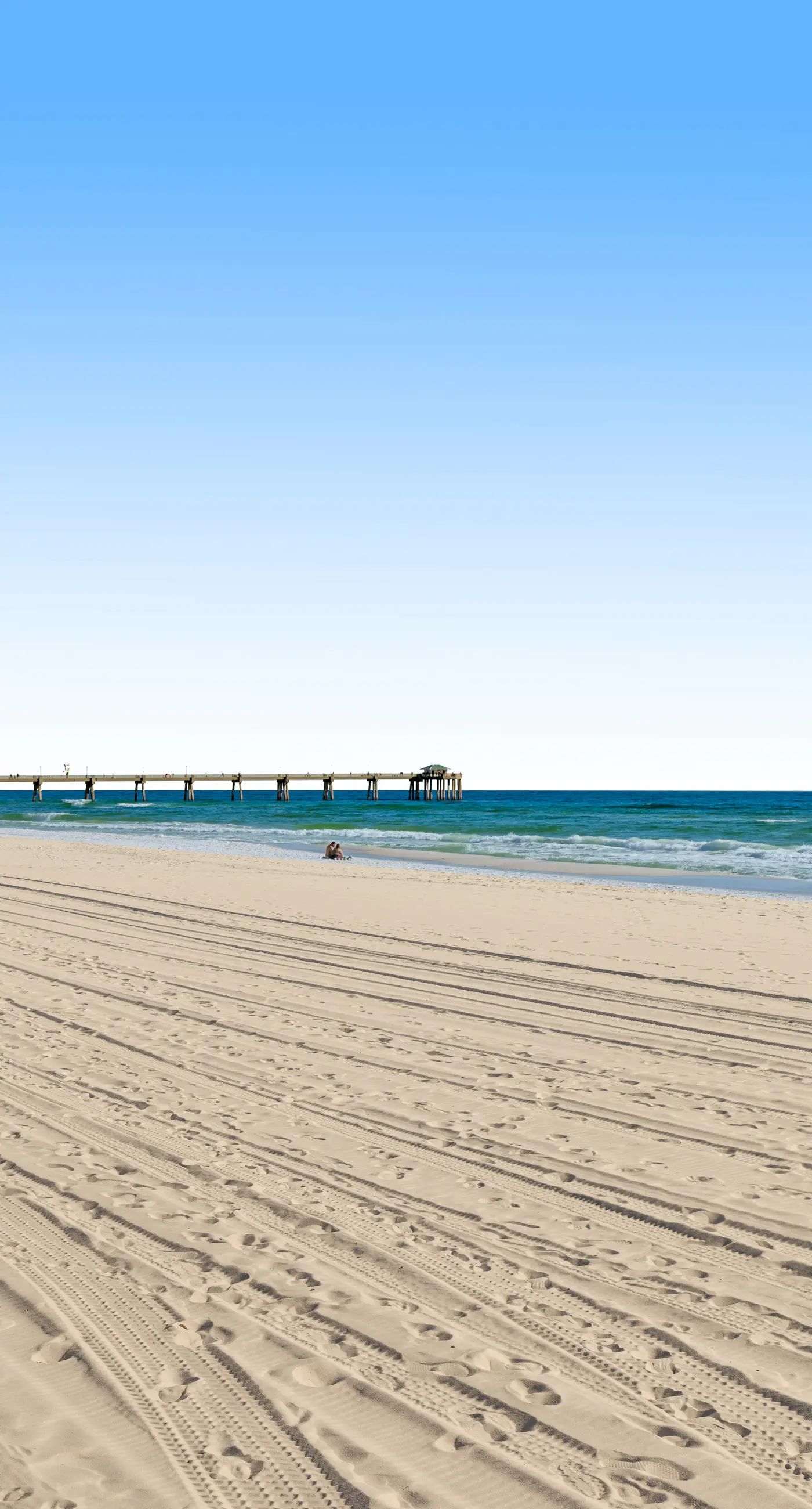 Elegant oceanfront condo with Gulf views, central AC, and shared pool & hot tub