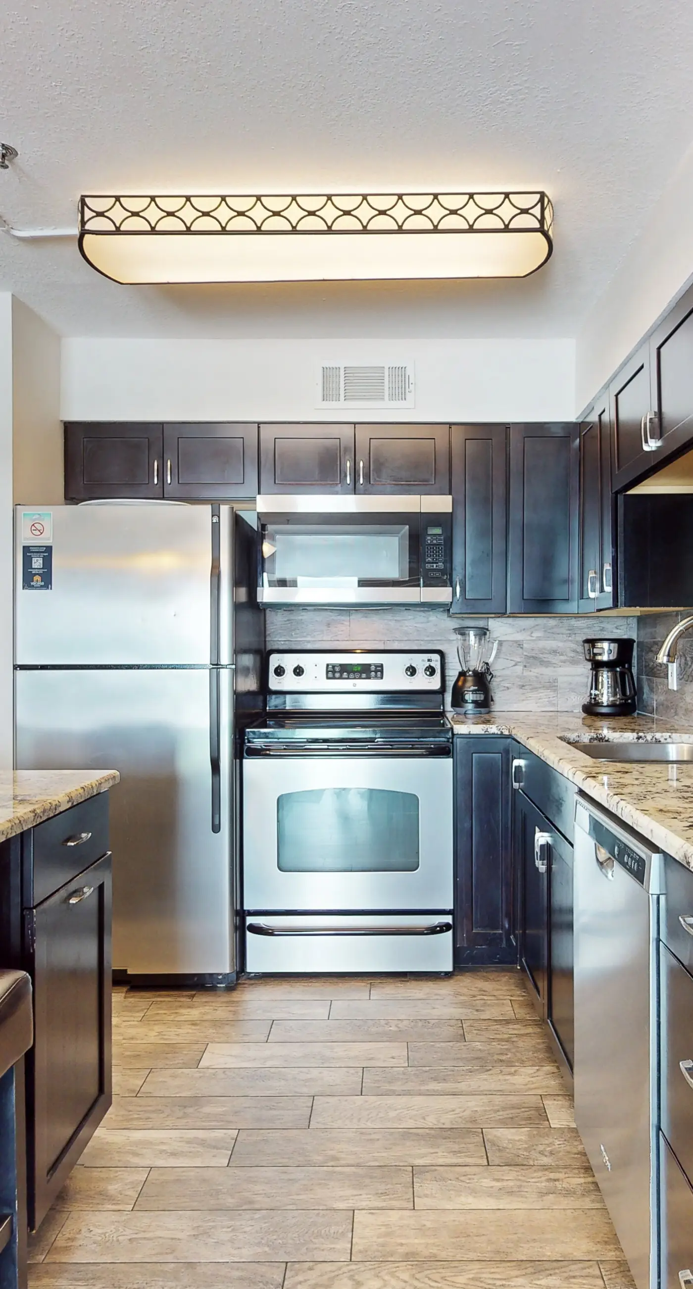 Upgraded Gulf Beachfront Condo with WiFi, Shared Pool, & Seasonal Beach Service