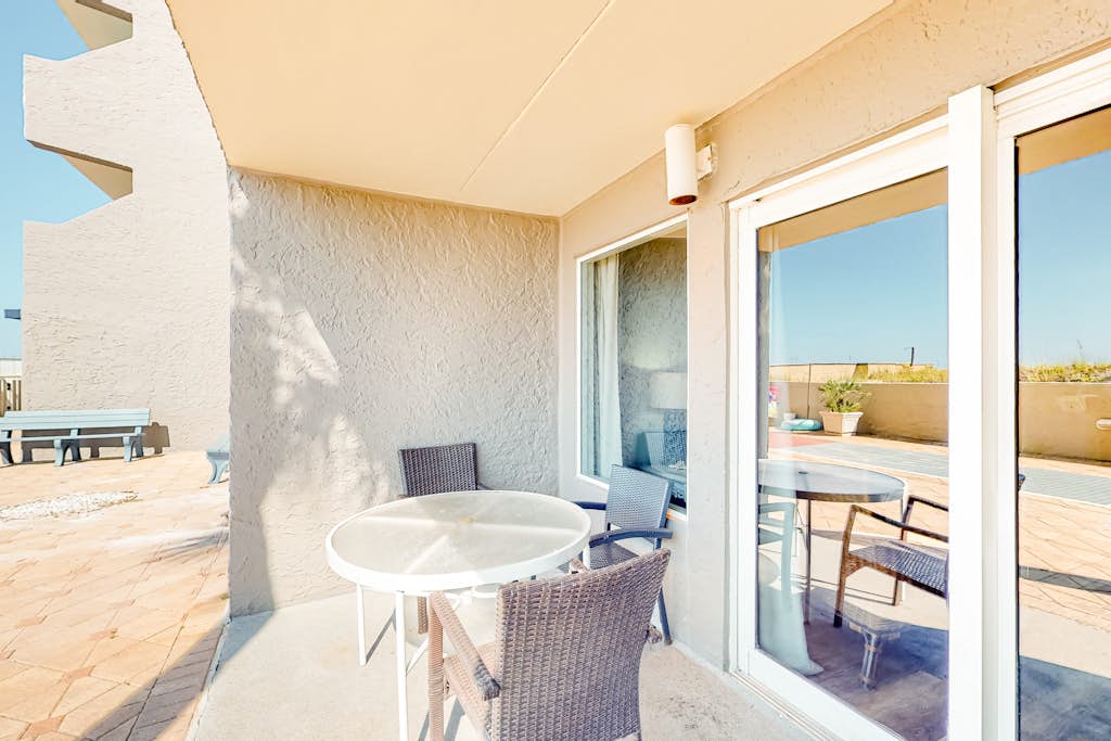 First-floor condo with pool, ocean view, & central AC