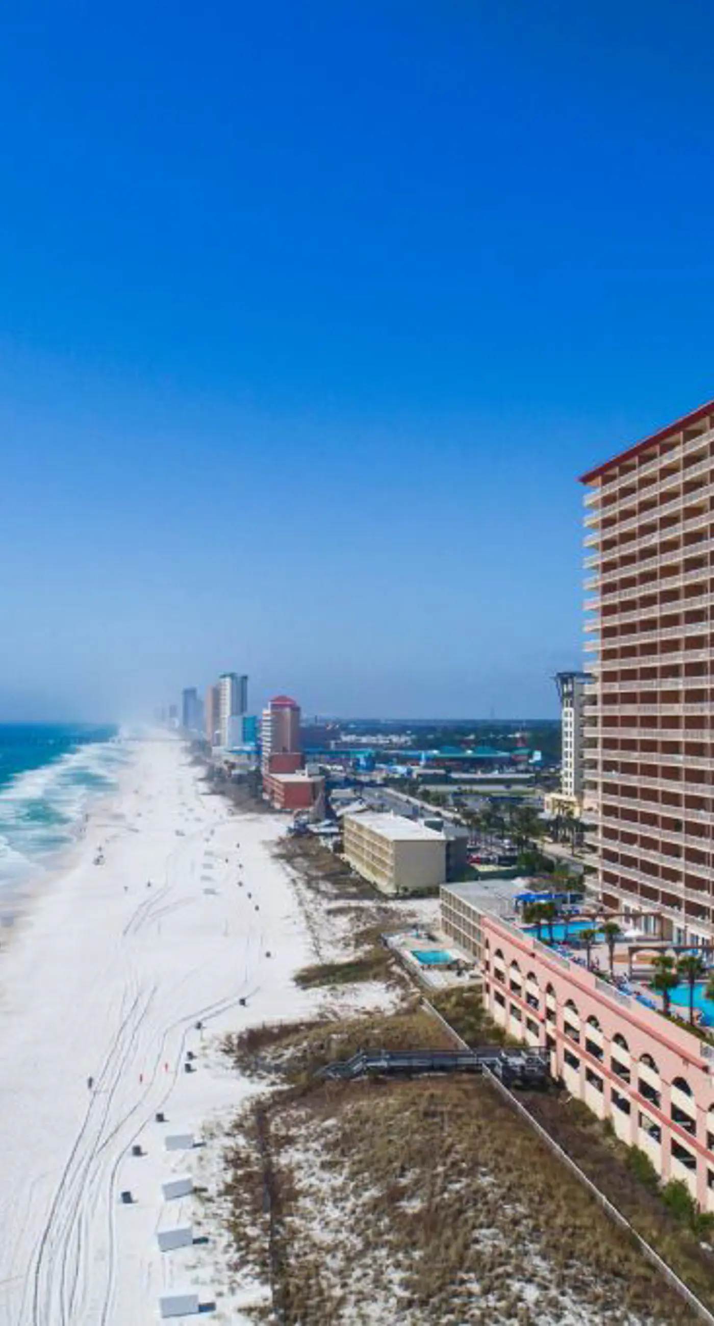 Oceanfront condo with pool, hot tub, splash pad & gym - great location