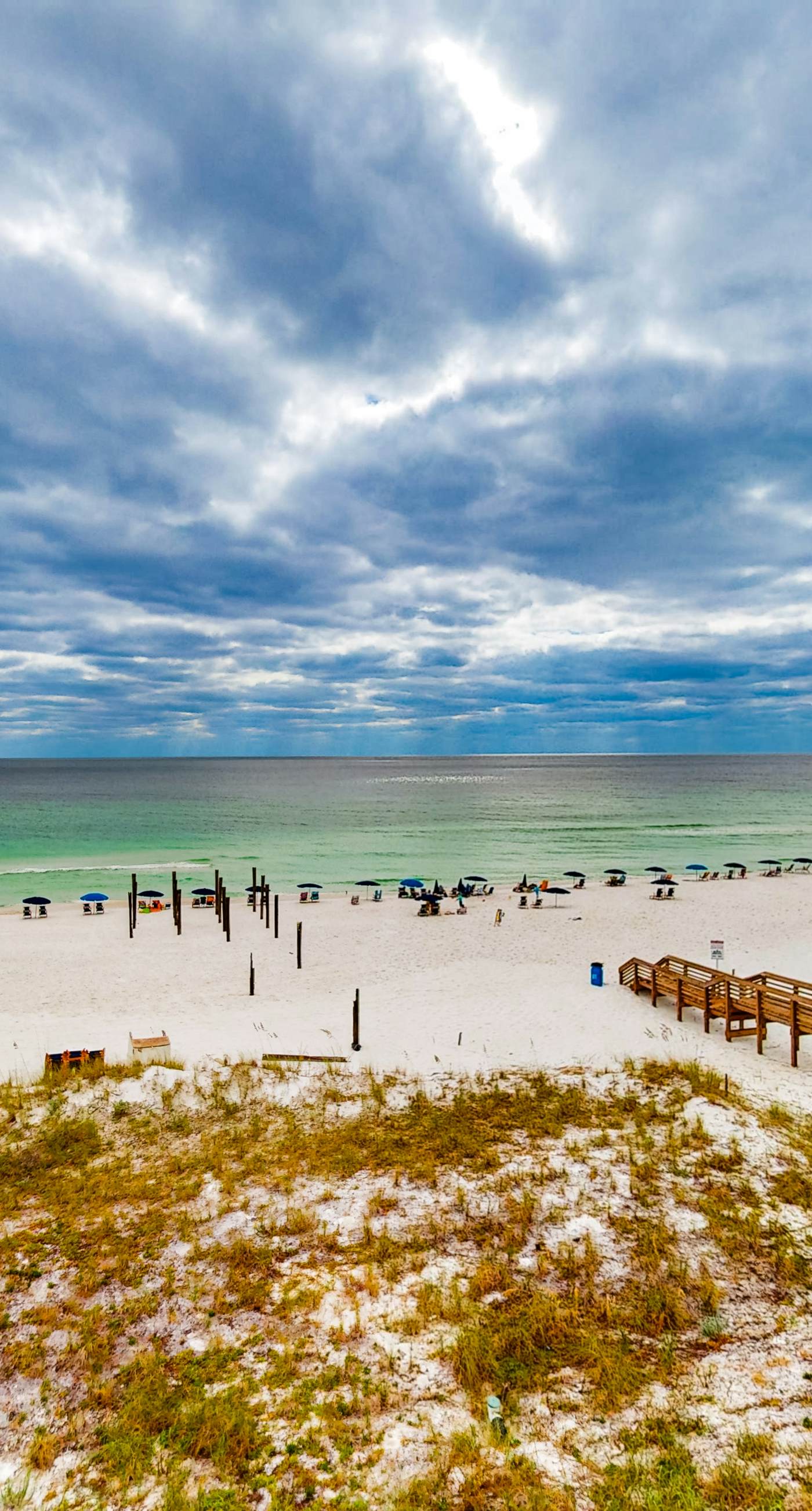 Oceanfront condo with AC, WiFi, pool & seasonal beach service