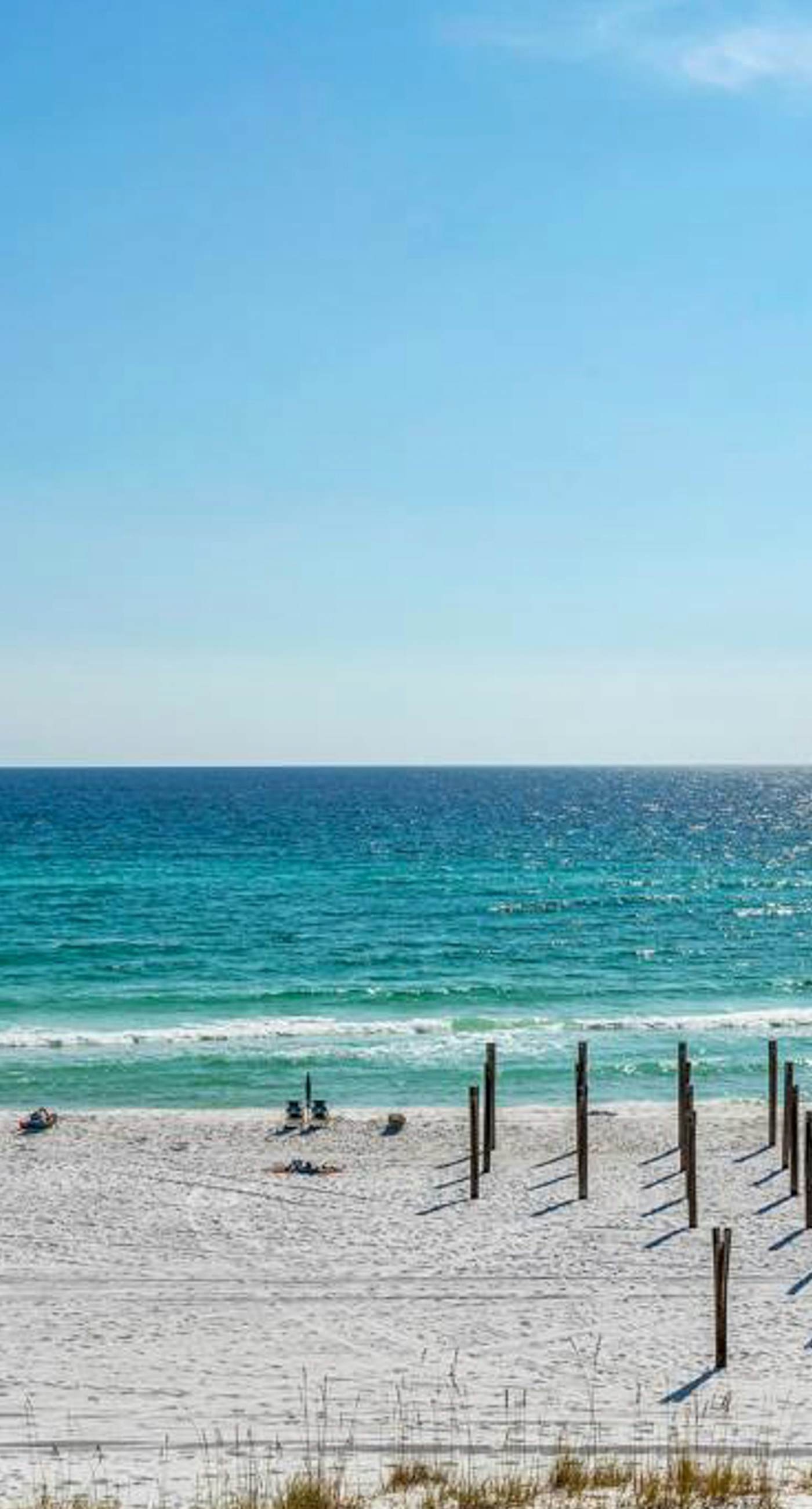 Oceanfront condo with AC, WiFi, pool & seasonal beach service